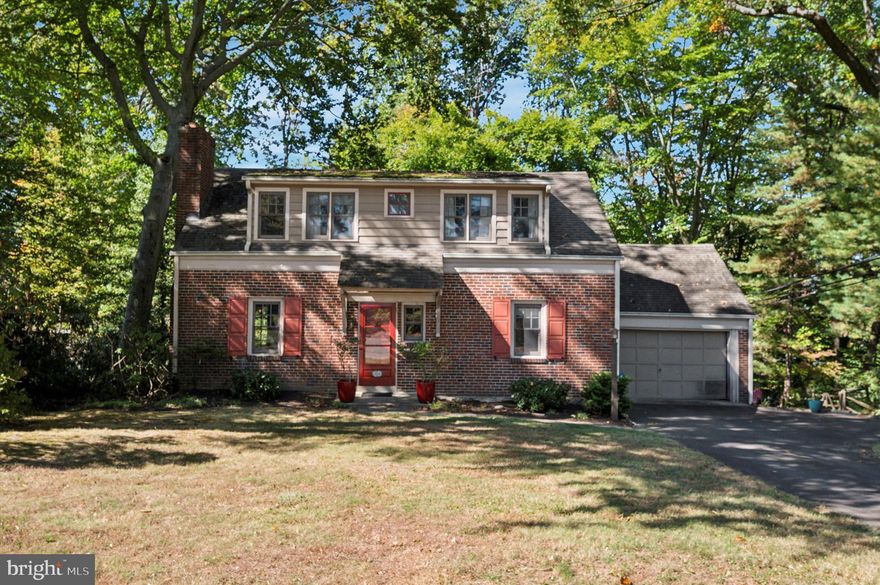 Welcome to 504 Custis Road, a charming Cape Cod-style single-family residence nestled in the picturesque Custis Woods neighborhood. This lovely home offers a warm and inviting living room with hardwood floors and a cozy wood-burning fireplace, along with access to a delightful covered porch—perfect for enjoying your morning coffee or unwinding in rain or shine.   On the first floor, you'll also find a bedroom and a full bath for added convenience. The open floor plan seamlessly connects the living spaces, flowing into a dining room that features a large bay window and custom built-in cabinetry.   A spacious family room with walls of windows fills the space with natural light, creating a welcoming environment. Custom built-ins make for convenient storage and enhance your television viewing experience. There’s even space for a small table, perfect for card games and casual gatherings. The kitchen is easily accessed from both areas.   Sliding glass doors lead out to a deck that overlooks a private backyard, surrounded by mature landscaping, offering a peaceful retreat. A full basement and a one-car garage add to the home's value.  Conveniently located just minutes from local shops, restaurants, parks, schools, and major highways, this home strikes the perfect balance between comfort and convenience. Embrace the vibrant community of Cheltenham Township, offering an array of amenities such as parks, libraries, community pools, and cultural events. With easy access to transportation options including train stations, highways, and airports, this location offers suburban serenity with urban accessibility. Enjoy Glenside with the July 4th Parade, numerous eateries, the Keswick Theater, Village Diner, Glenside Pub and more! Close to Chestnut Hill as well with boutique shops, fine dining and charm galore!  Offered AS-IS and priced to sell, don’t miss your chance to make this charming home yours. Schedule your appointment today.