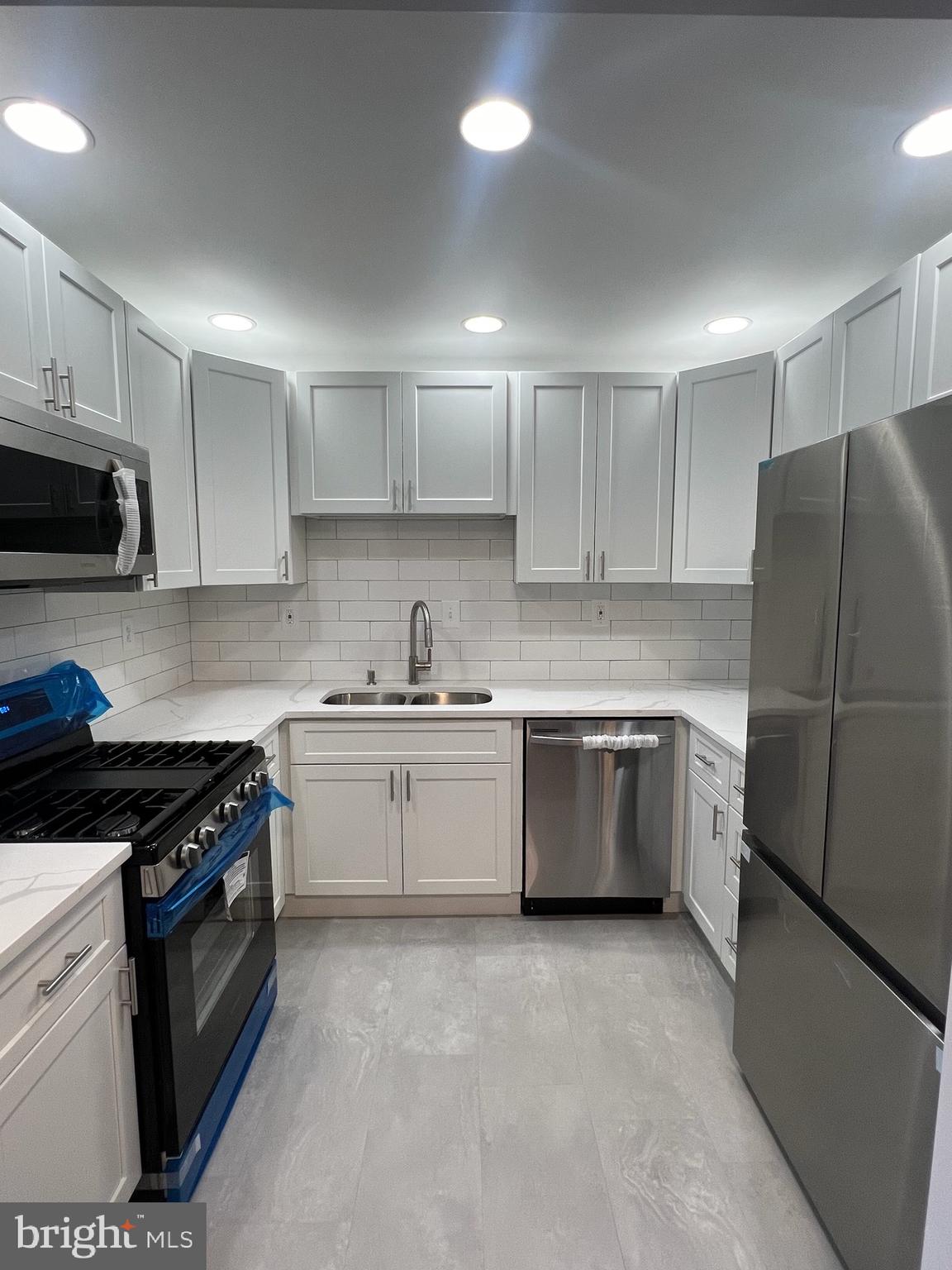 This is the deal you don't want to miss! Completely renovated 2br, 1ba luxury condo! The beautiful kitchen offers new shaker-style cabinets, recessed lighting, quartz countertop, ceramic backsplash, and brand new stainless steel appliances. The bathroom features stylish marble tile along the shower, walls, and floor. Bedrooms have new carpet/padding and large closet space. Entire unit freshly painted! Step through the french doors to the balcony and enjoy the outdoors. Condo comes with assigned parking and private storage unit. Condo fee includes water, sewer, gas, master insurance, trash, parking, etc. Right off of Suitland Parkway and minutes from Downtown, D.C. Come see this home today!