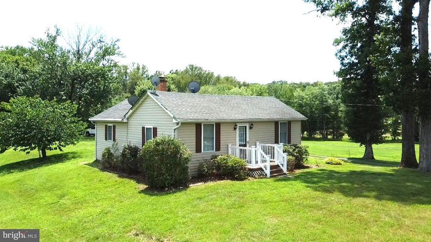 Enjoy peaceful country living in this cozy ranch-style home set on 3.5 mostly open acres in Midland, Virginia. With no HOA, there’s plenty of space for animals, gardening, or extra parking. Inside, the home features a spacious living room and a large eat-in kitchen perfect for meals or entertaining. Two comfortable bedrooms and a full bath complete the layout; all nestled in a quiet rural setting. Located in Fauquier County with an easy commute to the Manassas Airport VRE station and Quantico Marine Base, this property offers the charm of the countryside with access to major routes