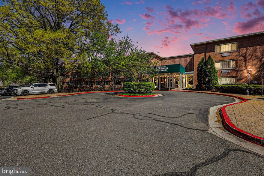 Location, lifestyle, and effortless living this one checks every box. Ideally situated just minutes from Old Town Fairfax, George Mason University, Fair Oaks Mall, popular restaurants, shopping, and a wide variety of international grocery options, you’ll love the convenience of this central Fairfax address.

Nestled within the highly desirable Main Street Green community, this condo offers one of the most desirable outlooks, overlooking a peaceful green space and the community pool. The setting is both serene and enjoyable, placing everyday essentials right at your doorstep.

Inside, the home is bright, spacious, and meticulously maintained. A generous living area and oversized windows fill the space with natural light while maintaining a quiet, comfortable atmosphere. The thoughtfully designed layout includes two well-sized bedrooms and a beautifully updated full bathroom.

Recent updates include newer carpet and fresh paint throughout, along with new kitchen appliances and a newer in-unit washer/dryer combo for added convenience. The home also includes an assigned parking space, access to a full-size storage unit, and ample guest parking.

Even better, the condo fee covers all utilities, simplifying your monthly expenses.

This is a rare opportunity to own a move-in-ready home in an unbeatable location—perfect for everyday living or a smart investment in the heart of Fairfax.

For the commuter, this location is pure gold:

Minutes to Route 50, I-66, and Fairfax County Parkway
Close to Vienna/Fairfax-GMU Metro (Orange Line)
Easy access to Washington DC, Tysons, Reston, and the Pentagon

Whether you're searching for a condo near George Mason University, a low-maintenance Fairfax City home, or a smart investment with utilities included, this property delivers what others only promise.

See it… feel it… own it.