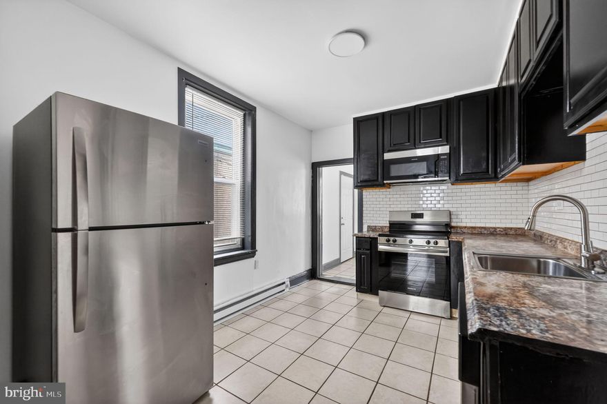 Free 1-Year Home Warranty Included to the Buyer!

Welcome to 4153 Orchard St, Philadelphia, PA 19134 — a spacious and updated 3-bedroom, 1-bath home offering comfort, convenience, and incredible value! This move-in ready property is fully electric and features central A/C for year-round comfort and efficiency.

The first floor showcases beautiful hardwood flooring throughout, creating a warm and inviting living space. Upstairs, you’ll find fresh carpeting and generously sized bedrooms. The kitchen includes newer appliances, making it truly turnkey for the next owner.

Major updates provide added peace of mind: roof, windows, and heating system have all been replaced within the last 12 years, and the water heater was replaced within the last 4 years.

A standout feature is the large first-floor laundry room — with enough space to easily add a second bathroom if desired. Step outside to your private, fully enclosed backyard, perfect for kids, fur babies, and summer family BBQs.

Move-in ready homes under $200,000 are hard to find — schedule your private tour today before it’s gone!