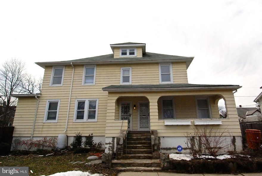 Beautifully updated home on large, fenced, professionally landscaped lot. Remodeled kitchen w/ granite counters, newly finished hardwood floors, freshly painted, partially finished basement w/ plumbing for additional bath & laundry room, finished attic, large garage w/ workshop. A "green" rigid pervious driveway system installed by Blue Water Baltimore. A large, charming, bright and sunny home!