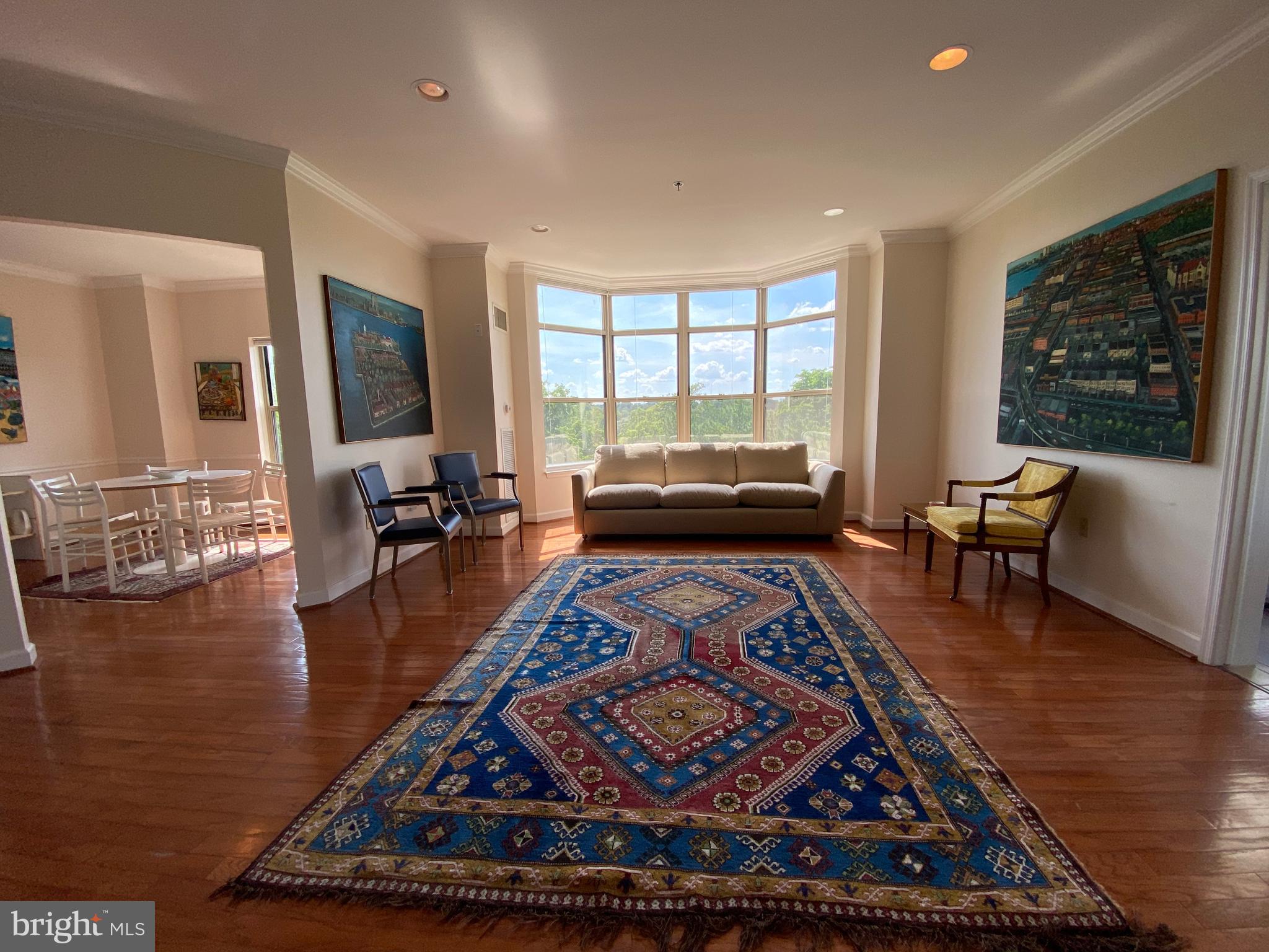 Spacious corner unit 2BR + Den with 9 foot ceilings provide extra-tall windows with abundant natural light. Panoramic views of gorgeous sunsets. Maplewood Park Place offers the best of ALL worlds for active adults, 62 age or better: home ownership, an engaged and independent lifestyle, and the full continuum of care - all under one roof! Maplewood has been voted the "Best Senior Living Community" by the readers of Bethesda Magazine - for 11 years in a row. Conveniently located inside the Beltway, and within a mile of Medical Center Metro, it's only minutes away from shopping, restaurants, cultural attractions such as the Strathmore Center for the Arts and Arena Stage, places of worship, top-ranked hospitals and medical centers like John Hopkins and the National Institutes of Health, and the central business districts of Bethesda, Chevy Chase, Potomac, and Washington, DC. Maplewood provides independent living in a vibrant community, nestled in a safe, wooded suburban neighborhood. The Maplewood experience is defined by abundant activities; beautiful amenities and first-class dining, all easily accessible; 24/7 security and concierge services; and a highly attentive, engaging staff. We also offer assisted living, skilled nursing care, personalized memory care and support, and rehabilitation services for resident owners who may be ready to transition to more care. Our comprehensive Lifecare Plan is available for qualified residents, offering high-quality, long-term health care and/or assisted living at a very manageable cost. On the lobby level we also have our wellness clinic with Dr. Wilks, an internist. His services are covered by Medicare so there is no out-of-pocket expenses to you. This beautiful home comes with a corner Market on the Square, Bistro Piano Lounge, Elegant Ballroom, Beauty Salon and Barber shop, 9707 Cafe, and our formal restaurant - The Urban Table. All on the lobby level of Maplewood. You'll also find entertainment offerings and congenial neighbors in our billiards room, private dining room, club room, library, and art center.