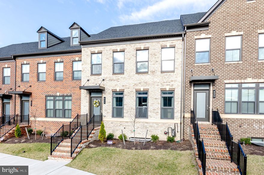 Welcome to this luxurious town home located in Greenleigh at Crossroads.  This one year old, 3 bedroom, 3 and a half bath, Ryan built town home is only available due to a job relocation.  This home features an open floor plan with scraped hardwood floors, nine foot ceilings, a gourmet kitchen complete with center island, stainless steel in wall oven/microwave combo, granite countertops, and 42" cabinetry with under cabinet lighting.  On the upper level you will find the owners 4 piece en suite with tray ceiling as well as two other generously sized bedrooms, a shared bathroom with a double sink, and 2nd floor laundry.  The main level as well as the lower level are wired for a sound system and a fully wired Guardian Security system has been installed in the home as well!  The lower level of the home features an additional full bathroom, a bonus room, and a large living space w/ walkout.  Additional features of the home include a detached 2 car garage, a trex deck off the first floor, tankless hot water heater, photo sensor exterior lighting, fire sprinkler system, pedestal washer and dryer, remote controlled fans, data ports, and an upgraded banister.  This brand new community offers it all with restaurants, fitness center, and spa/salon all within a short walking distance.  The resort style clubhouse and pool are under construction and should be completed this year!  Conveniently located a short drive from I95 and 43 with the MARC Train just a 3 minute drive from the property makes getting around a breeze!  Be sure to put this home on your tour today as the builder is no longer building this model!