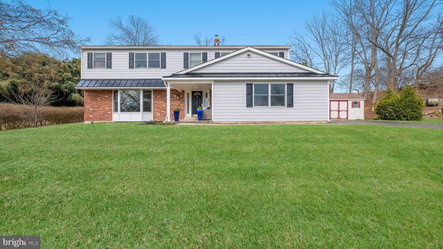 Showings start Saturday, March 14.  Welcome to the perfect blend of space, style, and serenity in the heart of East Goshen Township. Nestled on a 0.75-acre lot that backs to open land, this 5-bedroom, 3.5-bath home offers 2,830 sq. ft. of thoughtfully updated living space. As you enter through the covered front porch, you’re greeted by a bright foyer and hardwood flooring that extends throughout the living room, dining room, kitchen. stairs and second floor hallway. The living room is anchored by a stunning picture window, flooding the space with natural light. The heart of the home is the updated kitchen, boasting granite countertops, a center island, stainless steel appliances, and a bright breakfast area. Directly off the kitchen, you'll find a bright family room, creating an ideal layout for everyday living. For seamless indoor-outdoor living, new sliding glass doors lead to the spacious outdoor expansive wood deck from both the breakfast room and the dining room. The deck features a retractable awning. Adjacent to the kitchen area is a large first-floor laundry and mudroom and a half bath, providing the perfect transition from the 2-car garage. The second floor offers five generous bedrooms and three full baths. The primary suite boasts two closets ( one a walk in), and primary bath with walk in shower.A  guest bedroom has an attached private bath, and there is a full hall bathroom. With new siding and gutters, new Pella replacement windows, a finished recreation room, additional outdoor lighting and low taxes ($6,583), this West Chester Area SD gem is truly move-in ready! One year upgraded home warranty included.