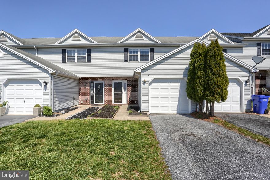 Welcome to Capital Ridge Community! Enjoy convenience, comfort, and low association fees in this beautifully updated, turnkey townhome. Featuring 2 spacious bedrooms, 2.5 baths, and a 1-car garage, this home effortlessly blends style and functionality. Step into a bright and airy living space with brand-new luxury vinyl plank flooring and fresh interior paint. The open-concept kitchen and dining area flows seamlessly into the living room—perfect for entertaining or everyday living. A convenient half bath rounds out the main level. Slide open the glass doors to your private backyard oasis, complete with peach and apple fruit trees and a charming pergola—ideal for outdoor dining or unwinding in your own serene space. Garden planter boxes await your green thumb. Upstairs, you'll find two generous sized bedrooms with ample closet space, each with its own full bath, new carpet, ceiling fans, and plenty of natural light. Don’t miss out on this inviting home in a sought-after community—schedule your tour today!