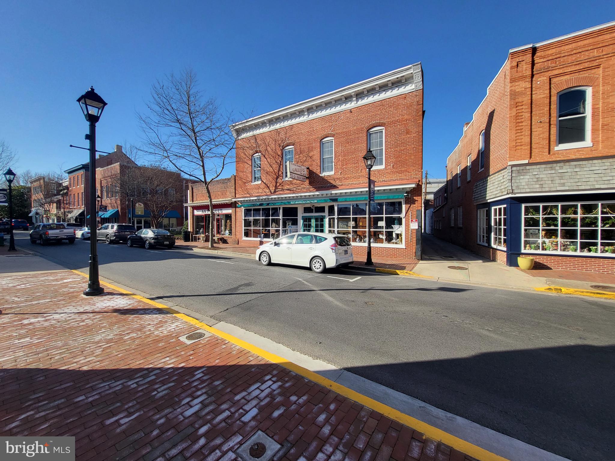 Classic brick downtown Easton Building that has been home to several long tenured successful businesses. Loads of potential on the ornate and wide open second floor. Move your business there to enjoy all the downtown foot traffic. The space is much larger than it appears.