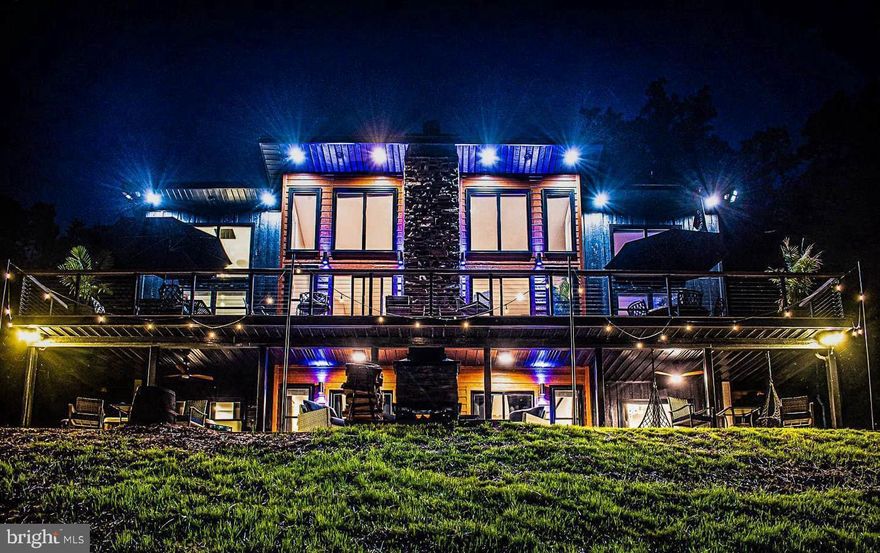 Welcome to Pirates Cove, a one-of-a-kind riverfront retreat located at 137 Pineview Dr in Front Royal, VA. This fully themed short-term rental offers a fun and unforgettable experience while showcasing the peaceful beauty of Shenandoah Valley waterfront living.

Nestled along the Shenandoah River on a rare deep-water stretch, this unique property blends adventure and relaxation with its immersive pirate theme, making it a favorite destination for families, groups, and vacationers seeking something truly memorable. Guests enjoy direct river access perfect for kayaking, tubing, fishing, or simply unwinding while taking in the serene water views.

The current host has done an exceptional job bringing the pirate theme to life, creating a playful atmosphere that guests love and remember. At the same time, the home’s layout and natural setting allow it to be easily reimagined as a modern riverside retreat with simple décor changes if desired.

Inside, the home features creative pirate-inspired décor throughout, giving every room character and charm while still offering comfortable modern amenities. The inviting living spaces and well-appointed kitchen make it ideal for entertaining or relaxing after a day on the water. Outdoor areas provide plenty of room to gather, enjoy the scenery, and experience the tranquility of this special waterfront setting.

The home has been thoughtfully upgraded with high-end custom fixtures and smart home technology throughout. Smart switches and dimmers allow lighting to be controlled remotely or by voice command, while recessed lighting and custom accent lighting create a warm and inviting atmosphere. Designer lighting features include under-island lighting, under and over cabinet lighting with customizable color settings, lighting beneath the deck railing, and striking up-down exterior sconces with color-changing capability. The entertainment experience continues with surround sound systems in the upstairs living room and theater area, featuring a 4K HDR projector and impressive 160” ultra-high-definition screen, perfect for movie nights after a day on the river. Additional comfort and convenience features include remote-controlled smart blinds, an 8-person hot tub, tankless Rinnai water heater, smart thermostat, and a heat pump system with propane auxiliary heat—all designed to enhance both comfort and efficiency in this exceptional riverfront retreat.

An added bonus: the sale includes additional building lots, offering exciting possibilities for expansion, guest cottages, or creating a multi-home river compound.

Currently operating as a successful short-term rental known as “Pirates Cove,” this property offers excellent potential as an income-producing investment, weekend getaway, or full-time residence.

Whether you're searching for a profitable vacation rental or a private escape, Pirates Cove offers a rare opportunity to own deep-water frontage on the Shenandoah River. Spend your days kayaking, tubing, fishing, and floating the river, then explore the endless outdoor adventures nearby including hiking in the George Washington National Forest and Shenandoah National Park.

This is Shenandoah Valley river living at its best—where adventure, relaxation, and unforgettable memories come together.