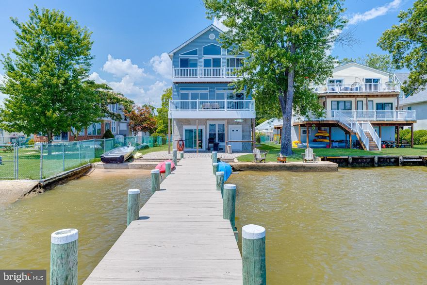 Welcome home to waterfront living! The main level boasts a large open concept kitchen living area with meticulously maintained hardwood floors and half bathroom for guests. Upstairs you will find three spacious bedrooms with two full bathrooms. The ground level has a full bath, living space, in addition to ample storage space. Amazing views will blow you away when you step outside or take advantage of the many windows. Composite decking awaits overlooking the water with glass railings to not obstruct the perfect water view. By boat, you have fast access to the bay right off of the river. All could be yours with a personal pier equipped with a boat slip and two jet ski lifts! Off of this dead end street, you can ensure privacy and no through traffic. What are you waiting for? Make 13119 E. Greenbank yours before its gone!