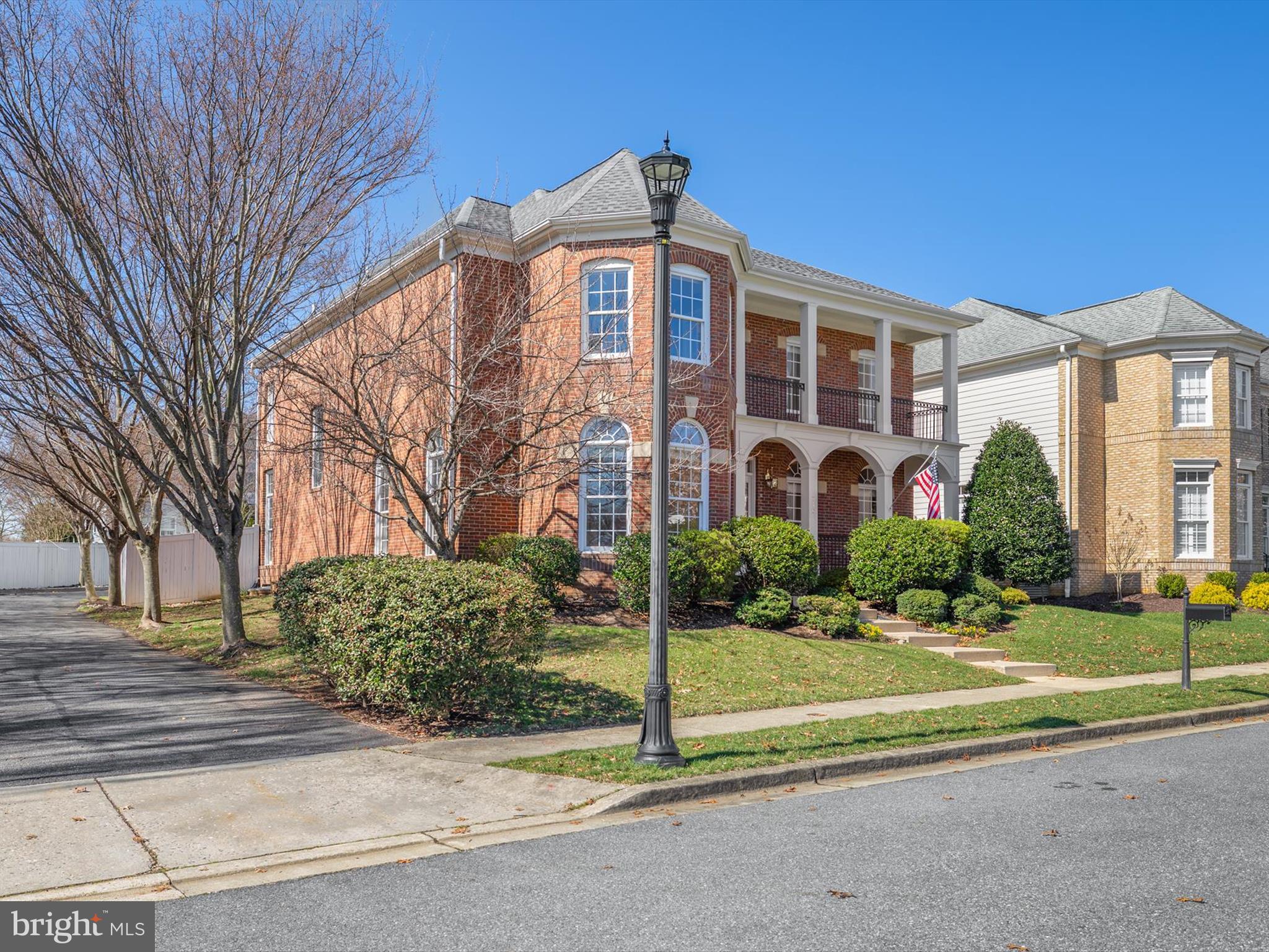 Sophisticated Elegance in Kingsport Of Annapolis
Tucked away in the highly sought-after Kingsport community, this exquisite three-sided brick home sits gracefully on a prime corner lot, offering both privacy and charm. Step inside to discover a thoughtfully designed space where luxury meets everyday comfort, bathed in natural light from expansive windows.
The heart of the home is its stunning open floor plan, where the spacious living and dining areas flow seamlessly. Two story great room is perfect for entertaining or family gatherings. Gorgeous hardwood floors stretch across the entire main level, freshly refinished to highlight their rich character. The formal dining room enjoys a charming bay window, perfect for intimate gatherings, and a custom-built dining table is available to convey. Opposite, a flex room off the grand entryway offers endless possibilities—a formal sitting area, a private study, or a cozy library.
Anchoring the home, the gourmet kitchen is designed to impress, featuring upgraded countertops, stainless steel appliances, and elegant cabinetry. Just beyond, the family room is a warm and inviting retreat, where a custom antique fireplace mantel serves as a timeless focal point. A dry bar and cabinet nook beside it add both charm and functionality, perfect for entertaining or unwinding with a favorite bottle of wine.
Upstairs, the luxurious primary suite is a true sanctuary, boasting his-and-hers walk-in closets and a spa-like bath with a soaking tub, oversized shower, and double vanity. Three additional bedrooms provide generous space for family and guests. One bedroom features a private bath and an elongated balcony, making it an ideal guest retreat, while the remaining two share a well-appointed hall bath.
The fully finished lower level expands the home’s versatility, offering a fully furnished gym, a spacious recreation room with ceramic tile, and an additional private office or bedroom with built-in bunk space that connects to a full bath. A large storage room with shelving ensures you’ll never run out of space.
Step outside to your fenced backyard oasis, beautifully designed with stone pavers, providing the perfect space for relaxation or entertaining. A two-car garage completes this incredible home.
Beyond your front door, Kingport’s resort-style amenities await—walking trails, a sparkling community pool, and water access, all just minutes from downtown Annapolis and its vibrant waterfront dining and shopping scene.
With a brand-new roof (2023), fresh paint, and new carpeting, this home is move-in ready, available for immediate occupancy and waiting to be yours. Schedule your private tour today and experience luxury living at its finest!