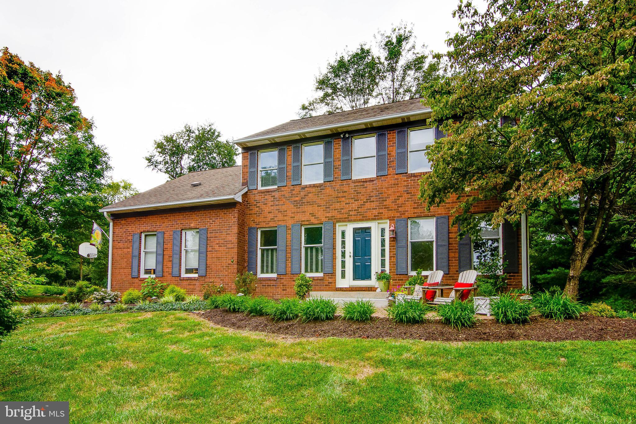 When you buy this home, you'll experience the best of all worlds! Great Howard County Schools with comfortable and spacious living while still convenient to shopping and major arteries to DC and Baltimore! Drive up on your private tree lined and landscaped driveway to a beautiful brick front stately Colonial home situated on 3 private acres with beautiful mature trees. Heated in ground 20x40 Venetian shaped swimming pool with attached spa and diving board is closed for the season but ready for Spring! The addition of this pool expands the outdoor family experience! Enjoy many evenings in the inviting screened porch off the family room with French doors overlooking the pool and yard. Inside, you will find a spacious foyer with beautiful wide plank oak floors, a first-floor library with built ins, plus a large living room with the wood floors and built ins. A large dining room decorated for an inviting formal dinner and featuring those gorgeous oak floors and a bay window allowing lots of light in can be found right off the updated kitchen. The kitchen features a center island and granite counter tops, Stainless Steel appliances and a breakfast area with bay window overlooking the beautiful back yard. The family room is right off the kitchen and features a wood burning fireplace and mantle and brand-new carpet. The upper level features 5 very large bedrooms, all freshly painted with nicely decorated with modern colors, all new carpeting, recently replaced 6 panel doors to the bedrooms, and an updated hall bath. The master suite is spacious with plenty of room and a large private bath. The walkout lower level is finished, inviting and ready for you to unwind. Great for a television area, home theatre and play area or whatever you decide to make it. There is also a large storage area and is plumbed for a bathroom. This is a private oasis and a real beauty! Right down the road from the Cattail Creek Country Club. Call your agent now to see this easy to show home!