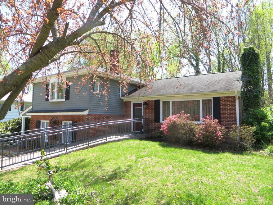 Delightful surprises everywhere--new master suite, remodeled KT, sunroom, screened porch! LR & DR main level, LL FR w/engin hdwd, cherry cab's w/wet bar, built-in bookshelves. New LL MBR w/ofc alcove, WIC, handi-accessible bath w/heated floor, private deck. 2nd MBR up, plus BR 3&4, FB. Ofc, mudrm, laundry/storage. Refin hdwd, ramp to front door, upgraded elec, fenced side yard! Pool shares convey!