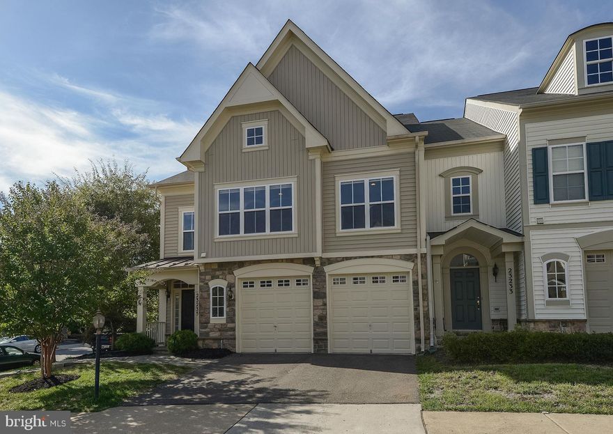 Unique end unit Townhouse w/approx 3200 sq ft. (tax records inconsistent for model). All freshly painted and hardwood floors throughout the entire home, gourmet kitchen w/SS appliances, granite counter tops, wall ovens, butlers pntry, recessed/task lights, LR French doors, built-in shelves, luxury master suite/MBA, loft. Welcome Home! Open House 10/16 1-4pm