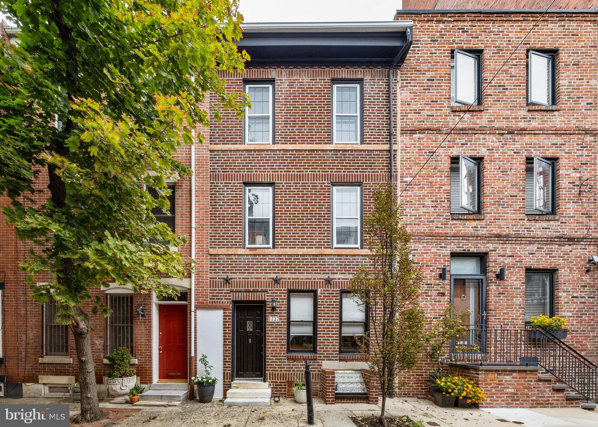 Welcome to 1727 Naudain - this 3 bedroom, 2 bathroom home packs all the charm and character in Rittenhouse Square. Enjoy hardwood floors and tons of natural light throughout. The first floor features both dining and living rooms complete with a wood burning fireplace that opens to a spacious patio. The kitchen is tucked below the first floor and features rustic exposed beams with track lighting, gas stove, stainless steel appliances and granite counter tops. Modern floating steps lead you to the second floor where you’ll find a full bathroom, bonus space perfect for your very own home office, and the first of three large bedrooms. The third floor hosts another full bathroom and the remaining two bedrooms. Highly desirable location with walkability to everything Rittenhouse Square has to offer. Schedule your tour today!