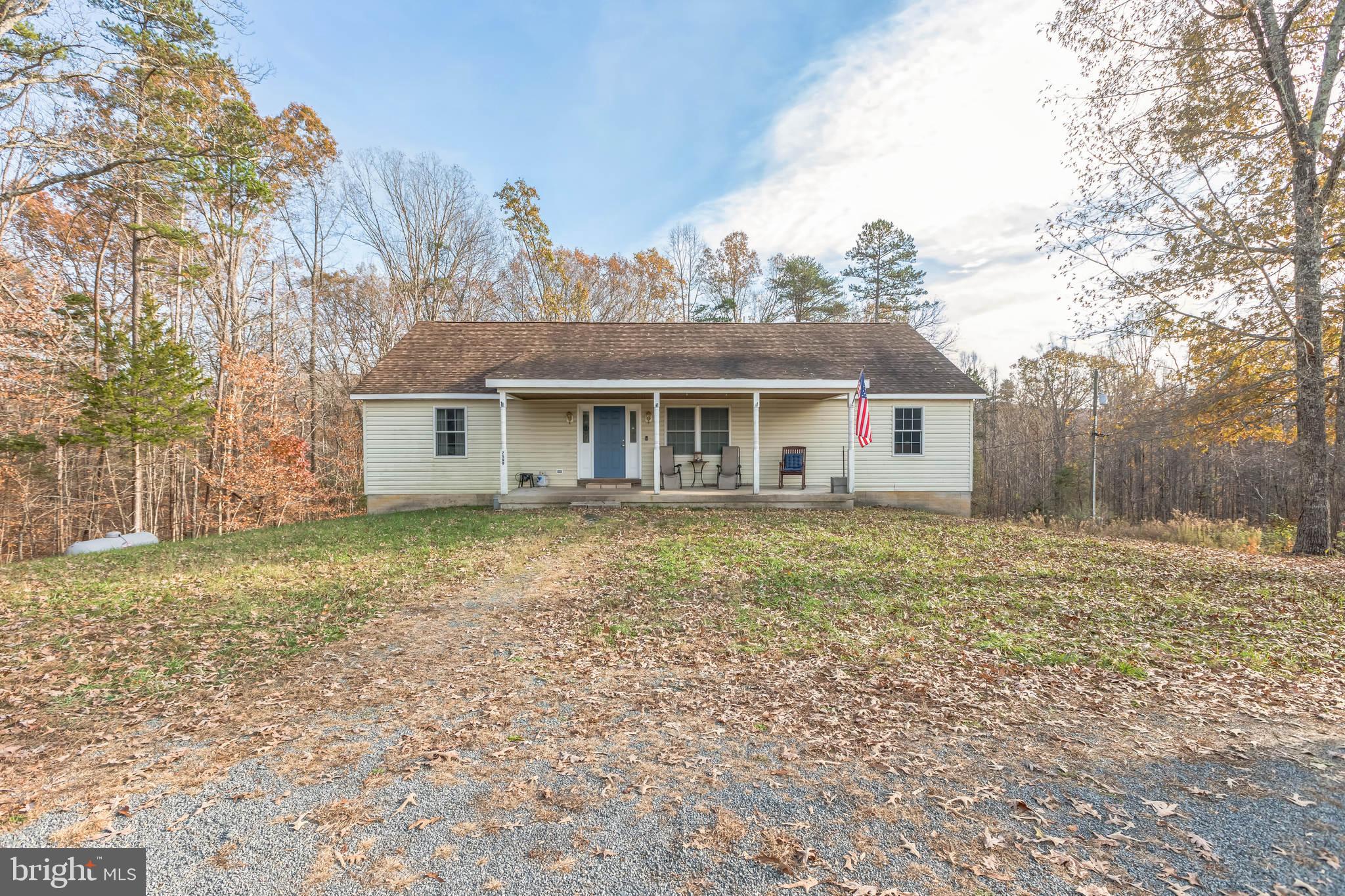 EXCELLENT FOR MULTIGENERATIONAL FAMILIES and Those Seeking MULTI-USEABLE LAND! MAKE THIS YOUR OWN! This deceiving ranch-style home provides more space than the pictures justify! Nestled on a peaceful 4-acre lot in Southern Albemarle County, this charming home offers the perfect blend of comfort and country living. With 3 spacious bedrooms and 2 bathrooms & a total of OVER 3,000 sq feet of living space, it’s an ideal retreat for anyone seeking tranquility and natural beauty. The primary bedroom features its own private ensuite, providing a serene space to unwind with modern fixtures and plenty of room. The heart of the home is the open-concept living area, where the large living room seamlessly flows into the expansive eat-in kitchen, creating a perfect space for both everyday living and entertaining. Hardwood floors run throughout the entire home, adding warmth and character to each room. Large windows throughout the home frame breathtaking views of mountains and starlit skies, bringing the outdoors in. A big, covered front porch invites you to relax and enjoy the stunning surroundings, whether it’s sipping your morning coffee or watching the sunset over the landscape. New HVAC within the last 5 years, new water pressure tank installed June 2024. Central heat/air with propane backup. Plenty of room for a deck out back! With plenty of space both inside and out, this home offers an incredible opportunity to enjoy peaceful, rural living, while still being close to amenities. This home is above builder grade boasting 2X6 framing throughout. There is an underground concrete storm safety room that could be used for storage as well! The lower level offers an opportunity for expansion to your liking. The lower level provides capped-off plumbing for an additional bath, wet bar, or kitchenette! The home has 50-year shingles. Convenient to Scottsville, Rt 29, and Charlottesville! Call Albermarle County for a Potential 2nd Home Site!