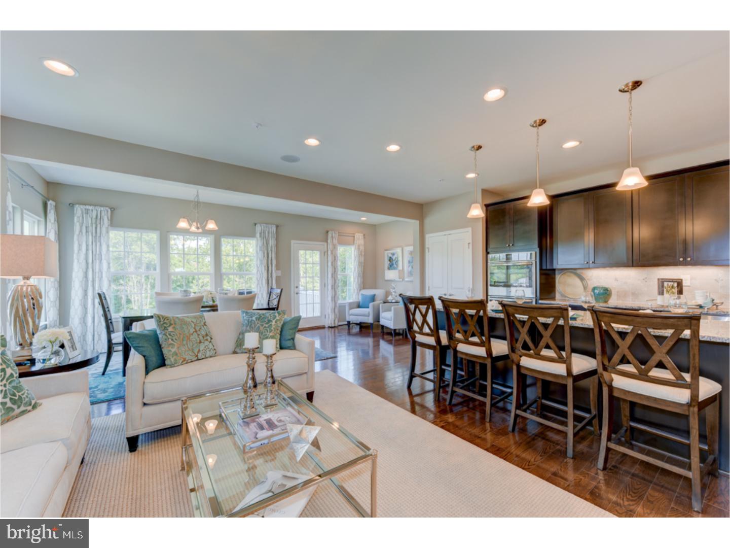 Quick Move-in home: final chance to move in during the summer! Living on the Main Line in the Great Valley school district can be affordable. At The Townes at Malvern, you'll find the best-priced new townhomes just minutes from West Chester, King of Prussia, and Exton. This BRAND NEW, end-unit home under construction offers a full warranty and a layout that is convenient and practical! The convenience of townhome living meets the amenities of a single family home in Ryan's new Roxbury Grande floorplan. This Quick Move-in end-unit home includes the following optional features: all 3 sets of side windows, hardwood floors throughout the entire main level, powder room on the main level and in the finished walkout basement recreation room, under-staircase finished storage closet, kitchen island, granite countertops, SS gas range, microwave, dishwasher, brushed nickel faucet, cabinet hardware, and exterior-vented exhaust fan. Upstairs, the owner's suite features espresso vanity with granite vanity top and brushed nickel hardware, and level B ceramic tile package. The hall bath includes an espresso vanity, granite vanity top, brushed nickel hardware and a level B ceramic tile package. There's a ceiling fan rough-in for each of the 3 bedrooms, plus 4 additional recessed lights for the great room. Garage door opener included. Stainless steel refrigerator and washer/dryer are included for sales by 3-24-17 only! This home, with optional features and homesite premium is discounted by more than $30,000 for a quick sale, what a deal! Plus, receive up to $4,500 cash towards closing costs when you finance through NVR Mortgage or make a cash purchase. Restrictions apply, see Sales and Marketing Representatives for more details before this amazing value is GONE.