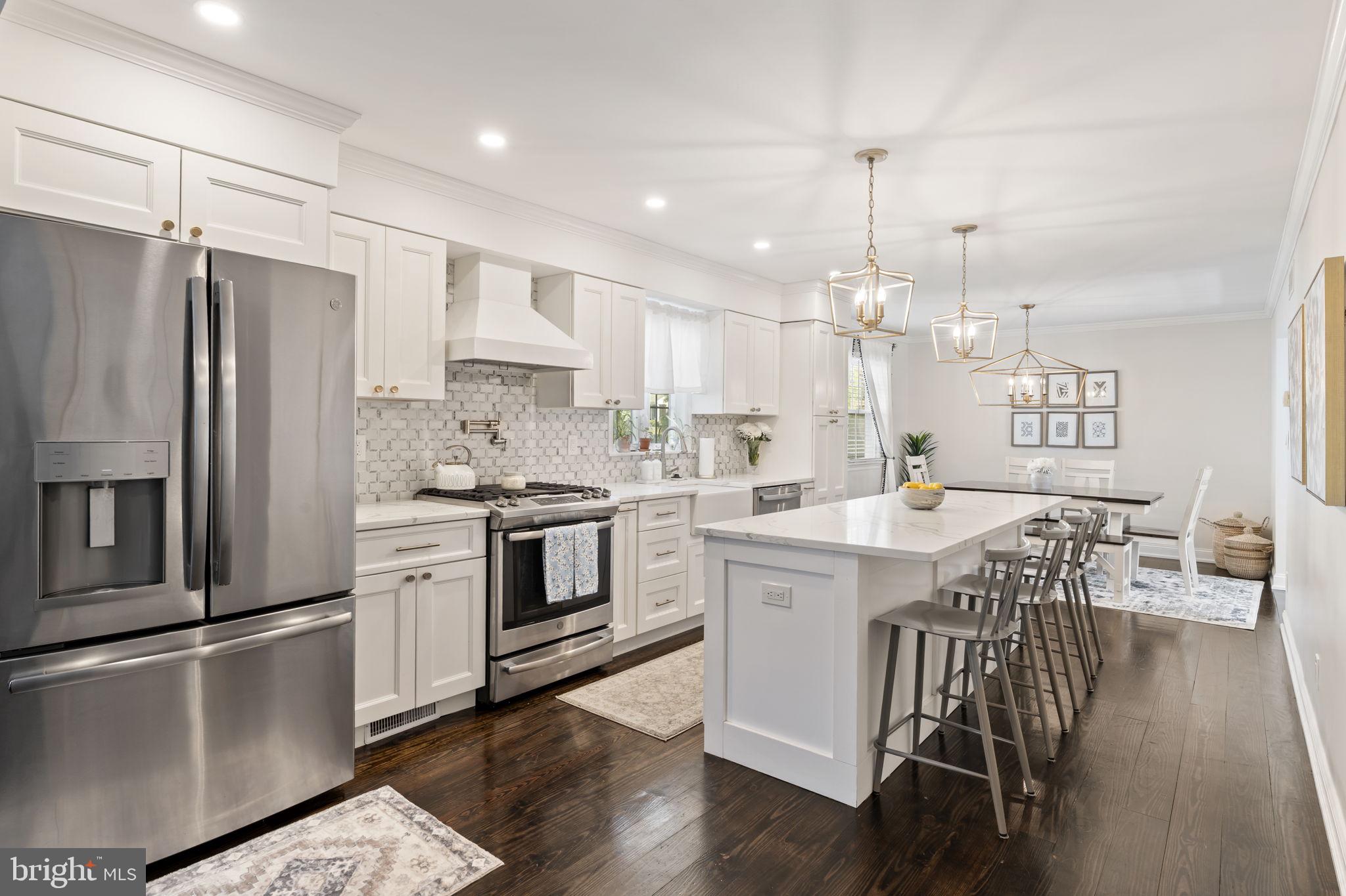 Welcome to Ambler, and to 102 Windsor Place! Close proximity to Downtown Ambler, Willow Grove Park, 309 Shopping, King of Prussia, Ambler Train Station, and Philadelphia. Walking distance to Butler Ave, Veterans Memorial Park, Loch Alsh Reservoir, and Upper Dublin Schools. Live on a cul-de-sac and move right in to this gorgeous, recently updated, red-brick colonial home in a fantastic suburban community which comes with the following: completely remodeled kitchen and dining area; family room with updated fireplace; half bathroom on first floor; three spacious bedrooms; classic living room; finished basement with additional WFH space or guest room; private rear deck with sliding doors; four car parking in driveway and attached garage. The kitchen features tons of cabinet space, massive island with counter seating, stone countertops, stainless steel appliances, and an open/light-filled workspace. The welcoming floor plan has hardwood floors + great natural light, as well as easy living and entertaining options, where you can enjoy Greater Philadelphia's four traditional seasons lounging on the rear deck or soaking up sun in the yard. You can choose to walk, drive, or use public transit on a daily basis with the Ambler Train Station about a mile away, as well as local gems including Bridget's Steakhouse, Harry's Taproom, Geronimo's, La Provence, and Forest & Main. This ideal + convenient location also allows you to walk, run, and bike in Fort Washington State Park, just a short distance from your front door. There are plenty of amazing golf courses/clubs (Manufacturers', Cedarbrook, and Sandy Run), and summer pools as well (Fort Washington Swim & Tennis, Life Time Health Club), to enhance your inner-suburban vibe. 102 Windsor Place provides an idyllic, suburban lifestyle with convenient access to Greater Philadelphia's fantastic restaurants, shops, recreation, and history!