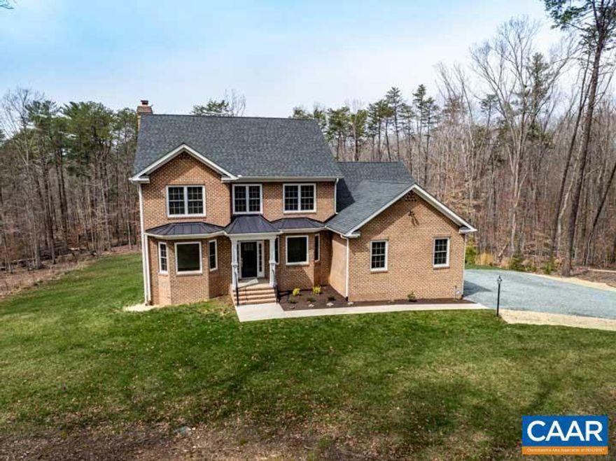 PERFECT Country LIVING w/in City Limits KESWICK AREA WELL-Built Custom Home on Sizeable WOODED & LEVEL 12 +/- Homesite, Nicely TUCKED away offers MUCH DESIRED PRIVACY Just 10 Min. to Charlottesville Many CUSTOM Interior FEATURES & UPGRADES Nicely Flowing Design FULL OF CHARACTER Offers MAIN LEVEL LIVING at Its Best Lg. Windows For Maxium Light Capture Hardwood & Tile Floors, Soaring Ceilings ELEGANT PRIMARY Suite & EN-SUITE BATH w/Custom SHOWER Formal Dining Rm & Parlor Huge Eat-in Kitchen, GRANITE Counters, Luxury Appliances, Lg. Pantry, Breakfast Nook w/access To Rear Deck 2-story ceiling in Living Rm w/Floor to Ceiling Stone Fireplace Add. 3 Generously Sized BRs on 2nd Floor & Full Bath Insulated Attic Access Freshly PAINTED Interior Plenty of Expansion Possibilities in Walk-Out Terrace Level w/Rough-in Plumbing Lots of Storage Spaces 2 Car Garage & MUCH MORE Perfectly Sited to Capture Ultimate PRIVACY All Around & MAXIMIZE OUTDOOR Living & Entertainment While Enjoying All Mother NATURES HAS TO OFFER Just Minutes To Pantops or Zion XRoads, Interstate All Shopping & Dining w/all Local FUN Amenities w/in CLOSE REACH WELCOME HOME TO Luxury Living in ALBEMARLE COUNTY!,White Cabinets,Fireplace in Basement