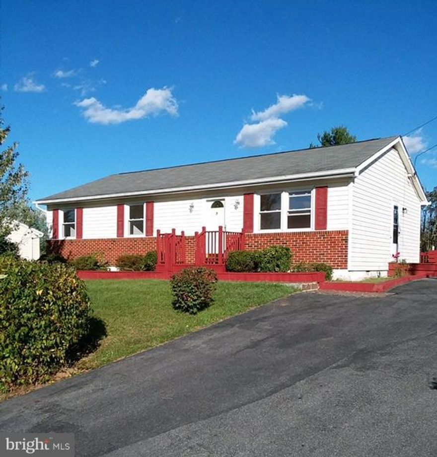 Ready to move in with new HVAC system, paint and updated kitchen, Large deck, huge back lawn with mature trees and two storage buildings. Addition open space behind this lot to enjoy. Paved driveway with lots of parking. Backup electric baseboard heat for individual room control. Roof shingles replace 10 years ago. Craw space updated November 2017