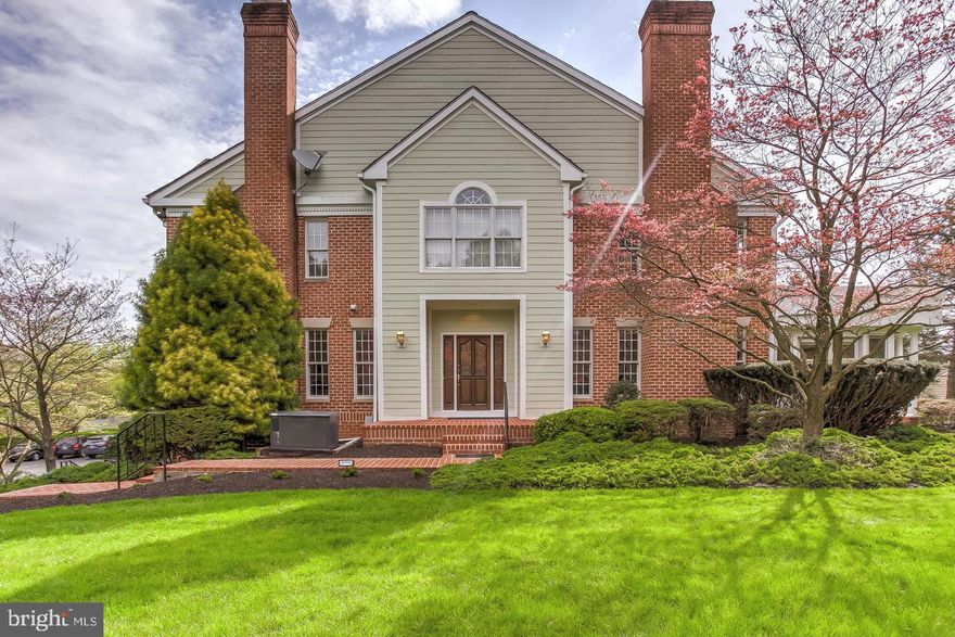 End-of-group Townhome with over 5000 square feet of finished space on 3 levels! Just recently refreshed. 2-story marble Foyer leads to formal Living Room & Dining Room both w/fireplaces. Large Family Room w/built-ins & wet bar, Sunroom w/walls of glass looking out to landscaped common green. Tremendous Kitchen w/breakfast area & seating area, main level Laundry Room. Master Bedroom w/marble spa Bath & Sitting Room w/fireplace + 2 additional large Bedrooms & Hall Bath on 2nd floor. Finished lower level w/Recreation Room, Den, large finished Storage Room, Powder Room & 2-car Garage.