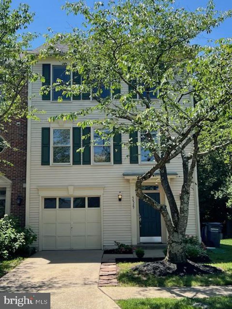 Newly painted light cream  with Benjamin Moore Paint, Gorgeous Real Hardwood floors, Stunning white kitchen with Quartz countertops and Island, super sunny and Backs to Trees!! Very PRIVATE  End unit with plenty of guest parking.  Enjoy relaxing on your deck w your favorite folks and a drink in peace! Quiet and No loud road noise or other townhome  behind you.  End unit gets tons of sunlight because it has windows on 3 sides. Large Garage and loads of guest parking.  Huge walkout lower level family room with 1/2 bath and fireplace. Sunny quaint park with benches to relax just feet away. Gorgeous Hardwood flooring,  ALL Newer Kitchen; white cabinets, quartz counter tops,  stainless appliances....Main level has tons of space, 2 family rooms, one off kitchen and breakfast table space in kitchen. Pretty Dining Room w designer lighting, Airy and spacious Primary bedroom with luxury bathroom to include a separate soaking tub, shower and double sinks. This place is Gorgeous!! End unit townhome with loads of windows on all 3 sides, Super Sunny! New Trex decking. Walk to all the Best shopping and restaurants, Starbucks, GIANT ect..  Sparkling and ready for new tenant. Easy communting to major routes yet quiet and peaceful. Good credit only, No Smoking.