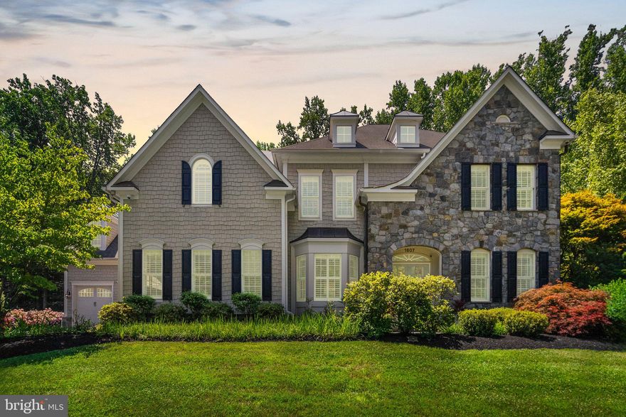 Wonderful opportunity to own a grand, stately enclave in Annapolis! This Craftsman style is the perfect marriage of opulence and charm. Nestled in the quiet Annapolis suburb of Wyatt's Hill sits a spacious retreat on a private, wooded 1 acre lot. Built in 2006, this home features over 9,000 square feet of living space across 3 levels. Features include a 4 car garage, 5 bedrooms & 4 full bathrooms plus 2 half bathrooms and a fabulous custom built pool and patio. Upon entry you'll admire the double door entrance, curved staircase & dramatic, circular 2 story foyer open to the upper level above & flanked by formal living and dining rooms. A gourmet chef's kitchen is connected to the dining room via a spacious butler's pantry. Prepare delicious meals in the sun-filled eat-in kitchen featuring over sized stainless refrigerator, double oven, gas cooktop, ample cabinetry and a large center island with granite counters. From the kitchen make your way to the open concept 2 story great room with walls of windows overlooking the private rear yard and pool. Work from home in the large main level study with double sided gas fireplace. Retreat to the bedroom level with 5 large bedrooms, an a loft overlooking the living room below. The primary suite will be your personal haven offering tray ceilings, a large sitting area and a sumptuous private bathroom with soaking tub, glass enclosed tile shower & dual vanities, and large walk in closet. An upper level laundry room provides utmost convenience. The lower level offers endless possibilities- a home gym area as well as a blank canvas awaiting your personal style and finishes. Enjoy the summer season and host fabulous pool side parties. Easy access to major commuter routes via major interstates. Just a short drive to shopping, dining & entertainment. Schedule your private tour of this amazing retreat today!