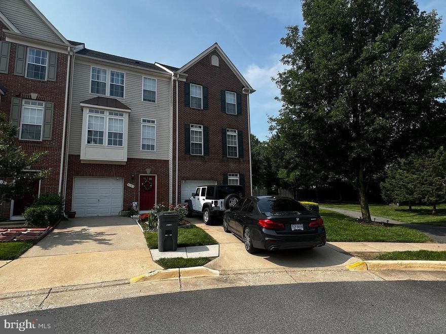 This beautifully maintained end-unit townhome offers comfort, style, and unbeatable convenience in a sought-after location. Featuring 3 spacious master bedrooms, this home is ideal for multi-generational living or anyone seeking generous private space.

The stately brick front adds curb appeal, while inside you’ll find gleaming hardwood floors in the foyer, kitchen, and half bath. The carpeting throughout the home provides warmth and comfort, with durable Berber carpet in the fully finished rec room—perfect for a home theater, gym, or game room.

Enjoy access to community amenities including a recreation center, and take advantage of the home’s unbeatable location—just minutes from I-95, and directly across the street from the public library and grocery stores for ultimate convenience. This is the one!