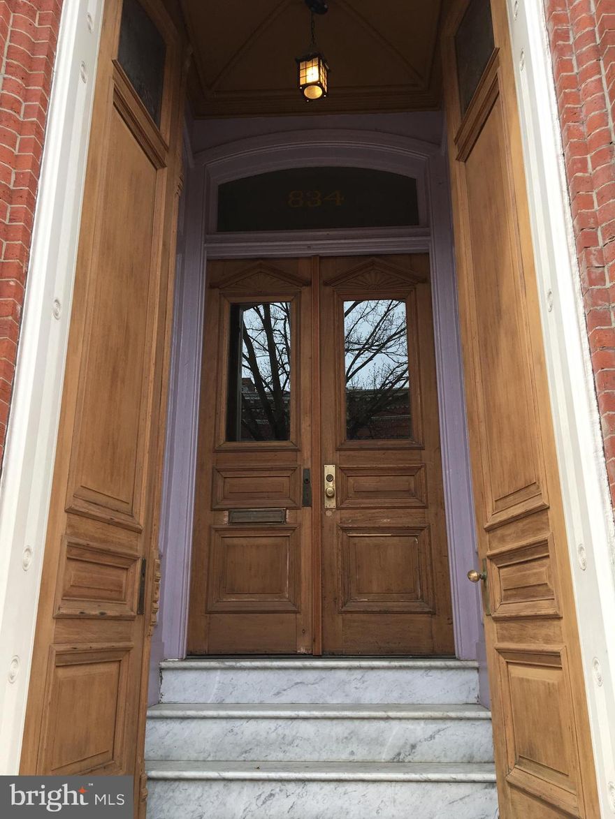 Beautiful, newly updated, apartment with high ceilings, hardwood floors throughout, and beautiful non-working original fireplace.  Outside use of common area rear yard.  Private assigned parking.  Wonderful street in highly desirable historic Mount Vernon.  Close to Penn Station, shops, restaurants, historic monuments, theater and universities.  Vouchers Welcome