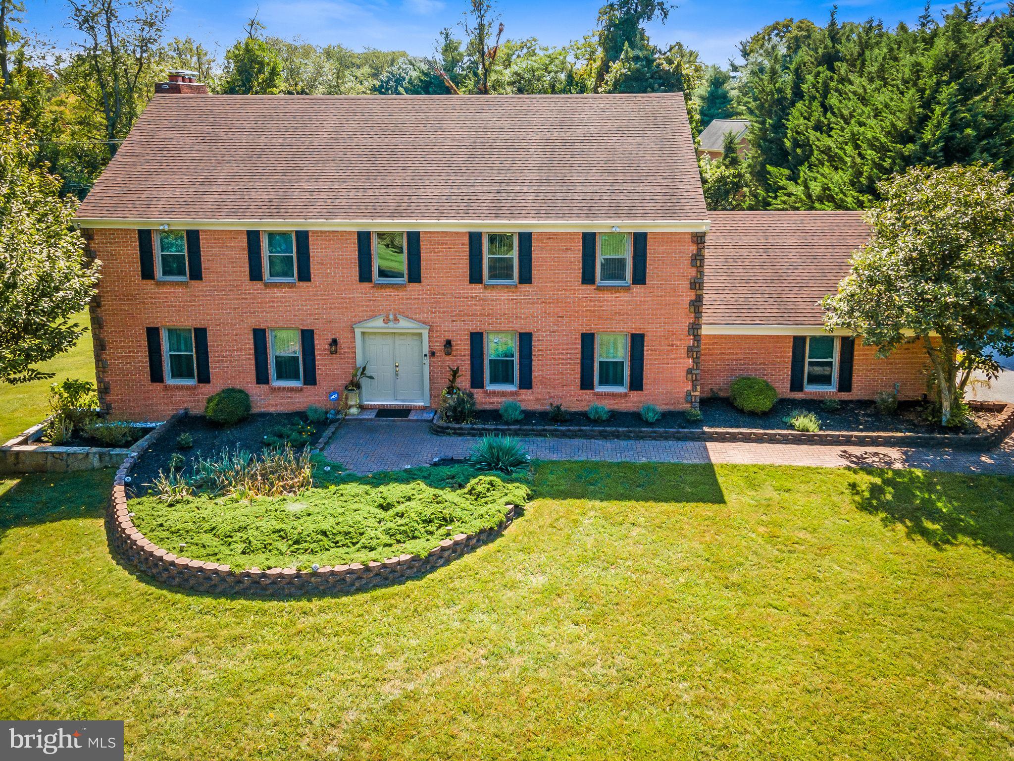Rarely available, superior to new, meticulously maintained brick colonial in Pikesville, MD. The vow factor begins with entering this gorgeous home through the front door. When you enter you will be amazed with a beautiful custom chandelier. To the left you have an extremely spacious living room and to the right you have glamorous dining room. Make your way through the house and enter expensive gourmet kitchen, with stainless steel appliances, granite counter tops and an island. Flowing seamlessly through the kitchen is the family room with a fireplace and an oversized all-season addition and a new huge deck with brand new custom owning. Beautifull crown molding throughout the entire house. On the main level is a powder room featuring ceramic tile floors and walls. Completing the main level is a laundry room and a walkout to the 2-car garage which is EV prewired. When you make yourself upstairs, there are 4 bedrooms and 2 full baths. The primary suite includes a generously sized bedroom area, seating area, fireplace, 4 closets and a master bath with jacuzzi, masterful tile work and a custom shower. There are 3 other bedrooms and a full bath on this floor. When you make your way to the basement, you will find a home theater with surround sound build in. New flooring throughout the entire basement. To the left you will find a custom-made bar with lights. There is a fifth bedroom, full bath, exercise room and a sauna. The house is equipped with a gas generator. When you make your way outside, there is a new driveway that fits about 10 cars. New windows throughout the entire house, new AC/Furnace and a new water heater. The house was freshly painted and ready for new owners. Must See!!!