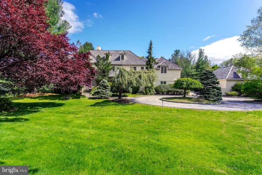 Some boots are made for walkin , and some houses are made for livin . Welcome to 107 Fairview, where you can raise a large family and entertain in an incredibly spacious and well-thought-out home. After you ve parked in one of the six oversized garage spaces, or in the double circular drive, walk down the bluestone walkway lined with mature trees to a double front door that opens into a soaring two-story foyer and living room. On this main floor, french doors welcome you to a huge, airy eat-in kitchen with an island that seats four and a sunlit breakfast area that can accommodate a table for eight. The full-sized refrigerator and full-sized freezer are the ultimate in Sub-Zero luxury. Just off the foyer, the lounge has a built-in sink and bar fridge, perfect for serving guests cocktails (or for the kids to serve themselves non-alcoholic beverages). You can also entertain guests in the formal dining room, the spacious sitting room and the two-story living room. In warm weather you can entertain on the deck and watch the kids play in the fully-fenced yard.Ascend the gracious staircase to the second level where you can overlook the living room from the Juliet balcony. Walk left to the master suite or turn right down the hallway to four large bedrooms (two have ensuite bathrooms). Complete with a chandelier, the master bathroom is an oasis where you ll find a deep tub to soak in after a long day, his and her sinks, and two walk-in closets. If you have a budding ballerina in your family, the third level has a ballet studio (that could double as a yoga studio) and a separate very spacious room for an office, game room, or playroom.From the main floor, walk down to the huge, fully finished walk-out basement where you ll find another bedroom with an ensuite bathroom, a den, a home gym, a powder room, and plenty of room for a pool table, ping pong table, arcade games, or air hockey. With this much to do downstairs, your guests or your kids will never want to come back upstairs except to eat.If you re looking for the perfect home to raise your family that has plenty of room for everyone to have their own space, or you love to entertain and host dinner parties and family gatherings, then 107 Fairview is for you.