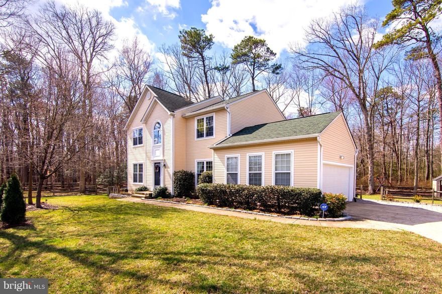 IT'S ALL IN THE DETAILS in this Spacious (over 3600sf!) Colonial! 4 Upper Level BR's,1st Floor Office, Gas FP in FR & Fantastic Sunroom! Entertainer's Dream Gourmet Kitchen w Built-in Wall Pantry Cabinets & State of Art Appliances include Double Oven & Induction Cooktop! Lower level has 5th Bedroom, FULL 2nd Kitchen & Gorgeously Designed Full Bath & MORE! All situated on .34 acre wooded lot!