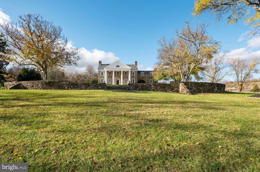 Welcome to Roxbury Hall! An inviting and spacious fully-renovated classic historic stone manor. Exemplary craftsmanship, wood floors, tall ceilings, and an abundance of natural light are found throughout this renovated home. This charming 5 bedroom, 2.5 bathroom stone manor home boasts 6 +/- acres situated in the foothills of the Catoctin Mountains. A true gem located 10 minutes from downtown Leesburg.  Adjacent to the main home, stands a newly constructed 3-car, detached garage with an unfinished space above (2022). As you step behind the home into the well-landscaped backyard -- perfect for entertaining --  a workshop and remodeled guest home (2022) sit opposite each other. The guest home was completely remodeled including a new roof, wrap-around covered porch, stainless steel appliances, flooring, and windows. Don't miss out on this opportunity!