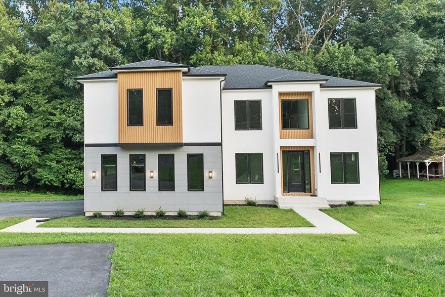 Move-In Ready Luxury – Builder’s Warranty Included! Nestled on a private 2.75-acre lot, this newly completed home blends modern elegance with thoughtful design. Featuring 6 bedrooms, 5 full bathrooms, and a spacious, flexible layout, this home is ready for immediate occupancy. Step inside to find wide-plank oak floors and a bright, open main level designed for both everyday living and entertaining. At the front of the home, a dedicated office space sits adjacent to the formal dining room—perfect for remote work or
 meetings. A main-level in-law suite offers a private retreat for guests or multi- generational living. The heart of the home is a stunning chef’s kitchen with a quartz island, walk-in pantry, and top-tier appliances, opening to a sun-drenched family room with a cozy gas fireplace. Upstairs, the luxurious primary suite is a true escape with a sitting area, private balcony, dual walk-in closets, and a spa-style bath complete with heated floors and a massive dual shower. Three additional bedrooms and a large laundry room round out the upper level. The fully finished basement adds even more value with a spacious rec room, additional bedroom and bath, plus two bonus rooms—ideal for a home gym, theater, or creative space. Exterior highlights include brand-new landscaping  to complete your outdoor living experience. Key Features: • 100% Move-In Ready – No delays • 2-10 Builder’s Warranty included • 6 Beds | 5 Baths |  6,000 sq ft • Front office + formal dining + in-law suite on main floor • Finished basement with two bonus rooms • Quiet and private 2.75-acre lot • Priced to sell – a rare blend of luxury and value