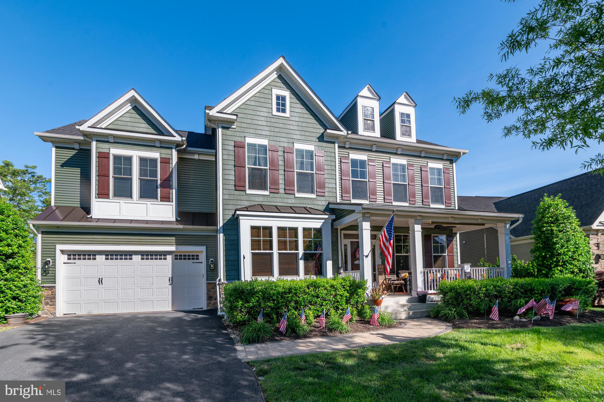 Rarely available, this absolutely stunning traditional manor home in desirable Brunswick Crossing with 5,000 finished sq ft is not to be missed! The Asbury model by Advantage Homes shows its quality throughout, having numerous upgrades on all three finished levels. Immaculately maintained, the homeowners spent over $50,000 last year on upgrading the deck door, patio door, and the windows in the back of the house to stunning Renewal by Anderson quality which greatly enhance the beauty of the home and the views in the back, as well as make the home very energy efficient. Solid oak floors and oak staircase with wrought-iron balusters, wood plantation shutters and wood blinds, fantastic dining room with extra bump out with space for all your friends and family to gather. The large kitchen opens up to the two-story family room with a floor-to-ceiling stone raised-hearth gas fireplace. Add to that an unforgettable morning room that exits onto a beautiful Trex deck w/stairs to the wooded and lush backyard. Large and practical mudroom with laundry near the 2-car garage entry. Walk up the oak stairs to the landing and family room overlook and take in the views from the second row of windows. The primary suite offers a large bedroom with tray ceilings and sitting area. His and her closets flank the large bathroom with soaking tub, shower and separate commode. All four bedrooms upstairs are spacious with plush carpeting. One of the secondary bedrooms has an en-suite bath and practical entrance from the hall while there's even a princess suite with its own private bath! The walk-out basement is fully finished with rec room, office, media room with screen and projector, and a storage room. It doesn't even feel like a basement as the new patio door, and the windows let in so much light, and you can walk straight out to the private backyard. New French drains in the backyard. New water heater. Whole-house water treatment system. You will not find better value or quality! 2x6 framing, beautiful wood trim surrounding all windows and doors, chair rails and molding. Watch the world go by from the deep front porch or relax in privacy on the two (2) stone patios in the backyard. Brunswick Crossing is an amenity-rich community with a resort-style pool, tennis courts, elegant community center, miles of walking trails, tot lots and dog parks, community garden, and much more. The market center has a grocery store and restaurants, with much more to come, and the MARC train in downtown Brunswick takes commuters to MoCo and DC. Downtown Brunswick is undergoing a revival with many quaint bakeries, shops and eateries popping up. Walk or bike along the C&O Canal, or enjoy the many wineries nearby. Don't miss this exceptional home with features rarely available in Brunswick Crossing. Welcome!