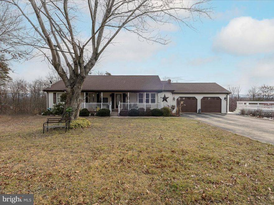 SELLER will pay $5,000 toward your closing cost with an acceptable offer!  VIEW & UNRESTRICTED: don't miss this 3-bedroom 2-bathroom rancher on 2 unrestricted acres conveniently located just a few miles from town. Home has a lot to offer, Harwood flooring in some rooms, main floor laundry, Jetted Tub in main bedroom, 2 car garage on main level, 1 car garage lower level, swimming pool, view and most important it's unrestricted. Sit on the screened porch and enjoy the wildlife & mountain view.  During the summer you can have the same view from the swimming pool. Basement has a family room with a woodstove hook-up, third bedroom and also an additional garage for all your toys. Don't hesitate, this one will probably go fast.