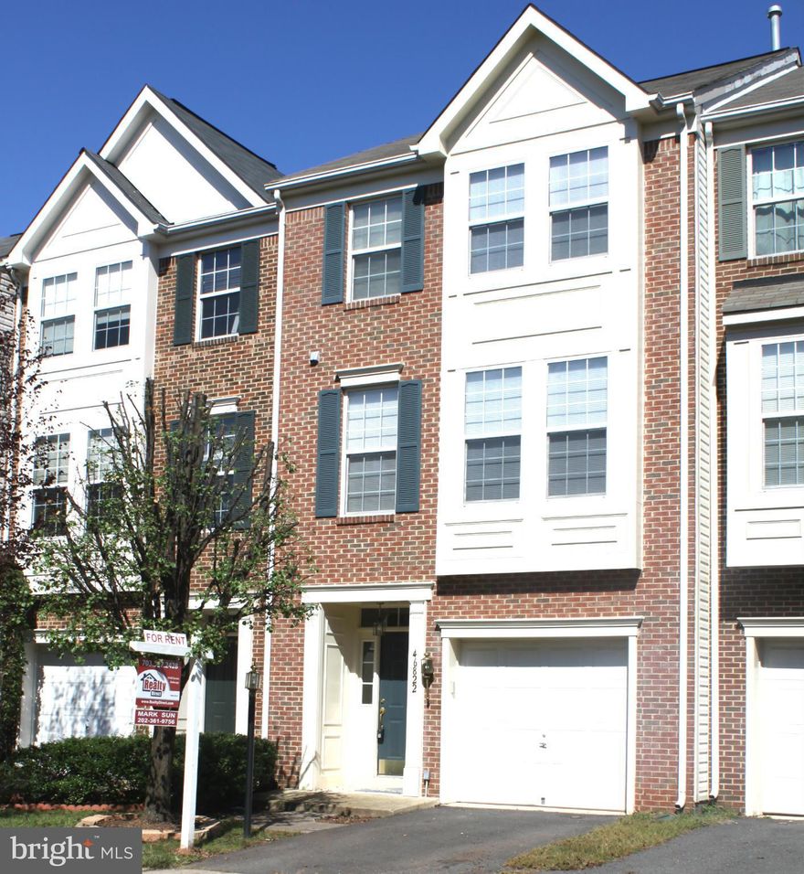 Brand new SS appliances. Lovely open and sun-filled floor plan. Kitchen and powder room and FP on Main level. Master suite, master bath with separate shower and soaking tub and walk in closet. Walk out lower level w/recreation room, half bath and laundry room.  Brand new large deck. One car garage.