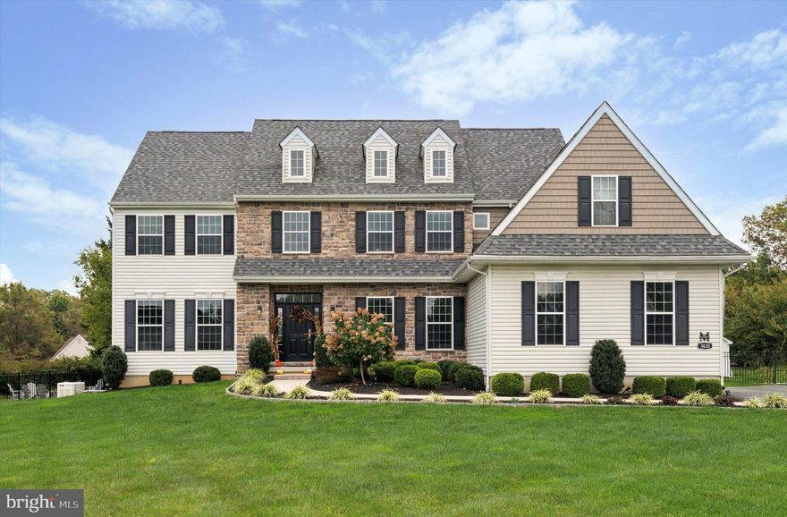 Welcome to your DREAM home! This stunning 4-bedroom, 2.5-bathroom residence, built in 2020, offers a perfect blend of modern luxury and timeless charm. Nestled on just over an acre of beautifully landscaped grounds in the sought-after Garnet Valley School District, this home provides privacy and comfort at the end of a private drive. The exterior exudes charm with a mix of stone and siding, accented by dark shutters and meticulous front landscaping. Step inside the impressive two-story foyer, with dual closets on either side of the front door. To the left, a spacious dining room invites you to host unforgettable dinner gatherings, while to the right, a bright living room is bathed in natural light. The heart of the home is the beautifully designed kitchen White cabinets are paired with stunning stacked glass cabinets, adding both sophistication and storage. A built-in coffee bar, gleaming granite countertops, and high-end stainless-steel appliances, including a Wolf gas stove, make this kitchen a chef’s delight. A farmhouse sink and glass tile backsplash complete the look, while a generous walk-in pantry keeps everything within reach. The adjacent breakfast room, with sliding doors to the back deck, is perfect for casual meals or morning coffee. Relax in the cozy family room, featuring a tray ceiling, gas fireplace, and a stylish board and batten accent wall. Natural light pours in through large windows and transom windows, offering beautiful views of the backyard oasis. An additional main-floor office, currently used as a bedroom and craft room, provides a versatile space to suit your needs. A powder room, coat closet, and convenient drop zone just off the 3-car garage complete the main level. Upstairs, the expansive primary suite offers a true retreat with a luxurious en-suite bathroom featuring a soaking tub, stall shower, double vanity, and a private water closet. A dreamy walk-in closet, office or flex space, and a linen closet providing extra storage complete the primary suite. Three additional spacious bedrooms, a full hall bathroom with double vanity, and a convenient laundry room round out the upper level. The finished basement is an entertainer's delight, boasting a bar area, a secondary family room, and an additional bedroom that can serve as a flexible space. Plus, an indoor batting cage is perfect for practicing your swing or making it your home gym! Two extra storage closets ensure you have room for all your essentials. Step outside into your private backyard oasis, ideal for hosting friends and family. A large in-ground fiberglass pool equipped with a Caribbean Clear system, pool heater, pool cover, and robot cleaner promises easy maintenance and endless fun. Enjoy summer gatherings on the spacious 25x25 TimberTech deck, featuring a curved bar overlooking the pool. This outdoor paradise is complete with a cozy pergola, fire pit area, and a 12x14 shed for additional storage. The entire area is enclosed with a 6-foot aluminum fence featuring two single gates and a double gate for easy access. Practical features like a Generac generator provide peace of mind, while a double-wide driveway provides plenty of parking, a front concrete walkway, and beautiful landscaping enhance the curb appeal and functionality of the property. This beautifully upgraded and maintained property is just a few years young. Don’t miss your chance to call this exceptional home your own. Home is where your story begins!