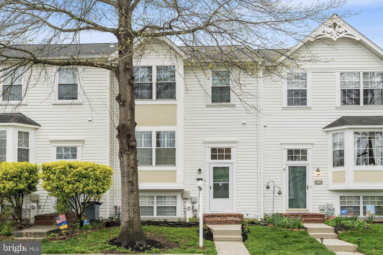 Open House Thursday May 15th from 6:15 to 6:45! Welcome to 22 Farm Gate Way! This spacious 4-bedroom, 2 full and 2 half bath townhome offers over 1,700 square feet of comfortable living space in a peaceful setting that backs to open space and parkland. Enjoy a bright eat-in kitchen with stainless steel appliances, including a new microwave and stove. The main level features updated laminate flooring and a cozy fireplace, perfect for relaxing evenings. The fully finished walkout basement adds extra living space and includes a dedicated laundry area for your convenience. Upstairs, you will find generously sized bedrooms with walk-in closets. Step outside to a private deck and patio area, ideal for outdoor enjoyment. Two assigned parking spaces complete the package. Conveniently located near shopping, dining, and commuter routes. Available for immediate move-in – schedule your tour today!