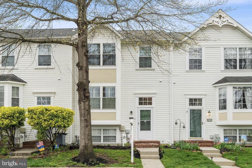 Open House Thursday May 15th from 6:15 to 6:45!  Welcome to 22 Farm Gate Way! This spacious 4-bedroom, 2 full and 2 half bath townhome offers over 1,700 square feet of comfortable living space in a peaceful setting that backs to open space and parkland. Enjoy a bright eat-in kitchen with stainless steel appliances, including a new microwave and stove. The main level features updated laminate flooring and a cozy fireplace, perfect for relaxing evenings. The fully finished walkout basement adds extra living space and includes a dedicated laundry area for your convenience. Upstairs, you will find generously sized bedrooms with walk-in closets. Step outside to a private deck and patio area, ideal for outdoor enjoyment. Two assigned parking spaces complete the package. Conveniently located near shopping, dining, and commuter routes. Available for immediate move-in – schedule your tour today!