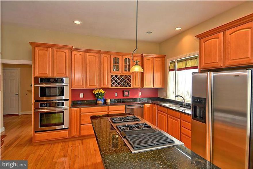 Open Sunday, April 3/1:00-4:00pm***Largest home in the neighborhood***Spectacular design and open space***High ceilings**Huge deck/fenced in yard**5 BR upstairs**dual staircases to upper**Beautifully maintained**Clean, move-in ready***Convenient to shopping***Near Herndon HS***You will not get this much quality home for the money anywhere in this area***Upgrades galore; too many to list here.