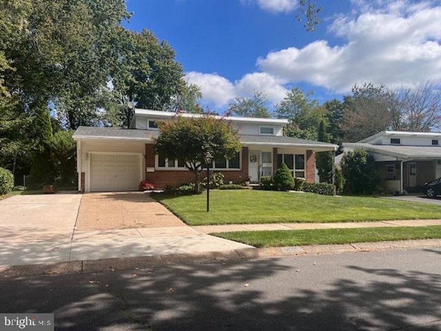 Don't miss this well maintained, maintenance free exterior, 4 bedroom, 2.5 bath home, located in the heart of North Wilmington. It is within the very sought after subdivision of Green Acres. There you'll find one of the most desirable swim clubs to join as well as some of the nicest tree lined streets around for an early morning walk or evening stroll.  Some of the features within the area include: a large number of supermarkets to choose from such as Wegmans, Trader Joes, Whole foods,  Sprouts, Giant, ShopRite and Acme. Some of the most premier restaurants are all within a comfortable drive, whether you're going into Pennsylvania, Maryland,  New Jersey or just staying within walking distance here at home. For those who are in need of the public school information, this home is within the very sought after Brandywine School District. 
This is a beautiful Mid-Century home with some of it's original charm as well as some updates for today's way of life and usage. The exterior has brick and vinyl siding, new 2-year old roof and replacement Anderson casement windows. The low maintenance landscaping adds wonderful curb appeal to the property. There is a 2-car wide concrete driveway that leads to a deep garage which is heated. 
The main level has a open floor plan with a beautiful living room that has wood framed Anderson casement windows, vaulted ceiling, wonderful plush carpeting and a wide view to the family room below. The dining room also has the same type windows, vaulted ceiling, plush carpeting over hardwood floors and custom wall to ceiling mirrors. The eat-in kitchen has granite countertops, tiled flooring, pantry and a dining area with windows for a great view of the front yard. 
The upper level has 3 bedrooms, 2 full baths, large linen closet, long hallway with vaulted ceiling, chair rails and a window for lots of natural light.  The main bedroom has a full updated bath, walk-in closet, vaulted ceiling and lots of windows. The hall bath is also updated with a jetted tub and custom tiling. 
The lower level has a family room with a raised hearth, brick wood-burning  fireplace. Lots of windows and wonderful plush carpet for a very relaxing, cozy and comfortable space. The laundry room has a wash tub and door leading out to the rear fenced yard. The 4th bedroom is also on this level and could be used as a study or den. 
Lastly, the large rear yard has a concrete patio and a huge outbuilding with electric and is hard wired for a land line telephone.