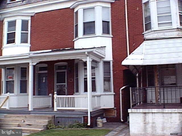 Row home near college, TLC needed.