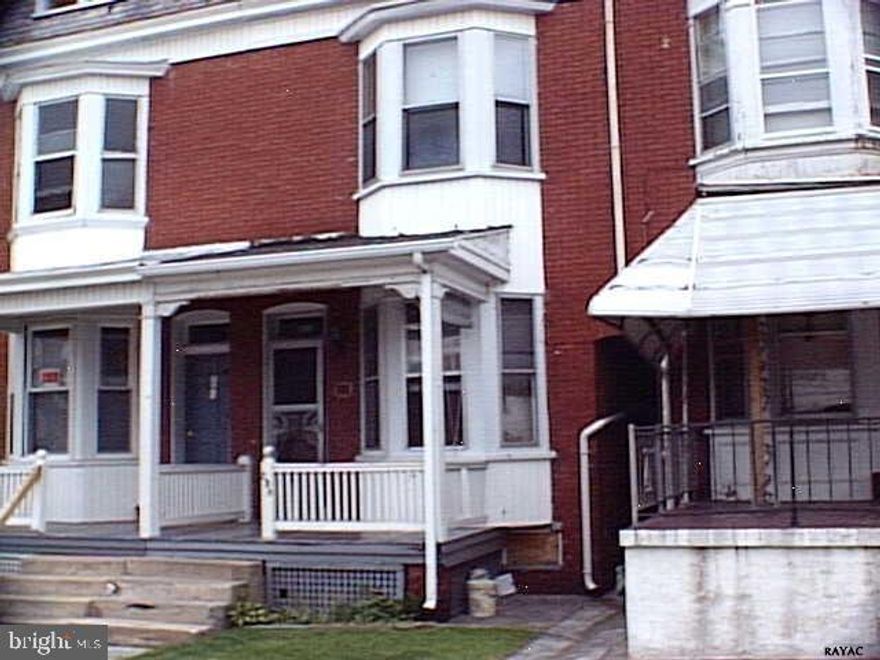 Row home near college, TLC needed.