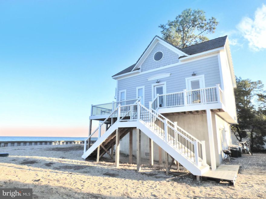 * Multiple offers in hand, Sellers are requesting best and final offer with a deadline of this Friday, March 29th at 3 PM*
 
Every day is a holiday on Holly Drive, classic beach vibes with a modern elegant twist.
 
Welcome to your spacious three level beachfront home on the Chesapeake Bay. Perfect as a relaxing and rejuvenating home away from home and as a welcoming gathering place, creating memories with family and friends, designed for events and holidays in mind.
 
The top floor offers a spacious suite with full bathroom, sitting room, and its own private balcony – perfect for falling asleep listening to the waves.  In addition, there are four closets (more storage than you will know what to do with!) – three massive enough to reimagine as a separate sleeping, exercise or office space.
 
The main level has two queen-size bedrooms with a full bath.
 
The ground level has a second primary bedroom complete with a full bath to include a claw foot soaking tub, large recreation room or second family room with a gas fireplace, laundry unit, and a fourth full bath.  
 
A gourmet light filled kitchen on the main level opens to a family room with glass sliders.  Expansive wrap around decking offers a peaceful place to relax with coffee in the morning as the sun rises and a glass of wine in the evening as the sun sets.
 
 
It's also a perfect spot for eating crabs or oysters. Spectacular front row Chesapeake Bay views no matter the season.
 
 
Like bird watching? There are no limits to the sights and sounds of nature. Here you will see bald eagles, swans, herons & ospreys to name a few. Catch your own dinner from your front yard, a fisherman's delight!
 
Realize what you have been missing with optimum Chesapeake Bay & beach views with incredible sunrises and sunsets your friends will dream about.  
 
Your future will be filled with long walks on the beach, beautiful water for kayaking, paddle-boarding, swimming and sunbathing. Wrap up your sun-soaked day with a refreshing outdoor shower while you gaze at the stars.
 
This astounding custom-built home is sure to capture your heart. Home is where the heart is♥️
Only 2 hrs from DC! 
 
 See this one soon!
 
*Home has been on Airbnb and VRBO, if interested in making this your Airbnb/ VRBO please ask for details*