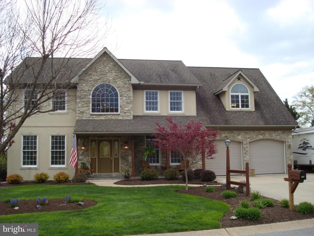 Absolutely Stunning Home - 9' ceilings on 1st floor, open foyer w/split landing staircase, kitchen peninsula seats 4 & breakfast nook, the ultimate grand master suite, candle light outlets under all Anderson windows, stunning wood floors, gas-fireplace/heat/dryer/stove/grill- hook up, central-vac, walk up attic can be finished, 31x23 finished game room in lower level with addt 33x12 storage, Best yard you'll ever entertain covered stamped