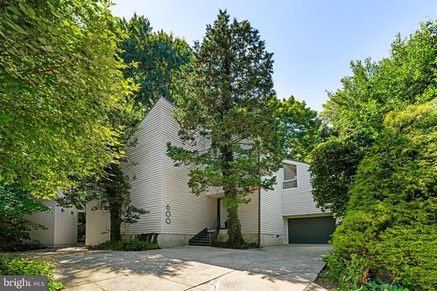 Here is your chance to own a rare Modernist enclave offering serenity & privacy w/ a detached home, detached studio, & workshop in the heart of sought-after Swarthmore. This property, being offered for sale for only the 2nd time since its construction, has been featured in The Wall Street Journal, The Philadelphia Inquirer, & other publications. Designed & built by architect Gene Spurgeon as his primary residence, the property consists of a 3544 sq ft detached home, a 600 sq ft detached architecture/design/flower/seed studio, & a 200 sq ft gardening/potting/tool workshop. With the preservation of original details to a level rarely seen. The grounds feature native trees, plant & pollinator gardens, porches, decks, flag & cut stone walkways, patios, water features, & modern horizontal fencing, all set within a private oasis just blocks from Swarthmore College, Scott Arboretum, Swarthmore Town Center, & the Farmers Market. The great location offers easy access to Baltimore Pike, I-476, I-95, Center City, Philly Airport, & is in the A+-rated Wallingford-Swarthmore SD. The home includes 3 bedrooms, 2.5 baths, a 1-car garage, & a 3-car driveway. The living room, the heart of the home features a 2 story floor-to-ceiling wall of windows & a wood-burning fireplace. The kitchen boasts a eating area & 2 pantries. Additional rooms include dining, family, laundry & storage rooms, vestibule, foyer, mudroom, wine cellar, & an office/den/library that can easily be converted into a 4th bedroom. The separate studio, w/ exposed wood vaulted ceilings, beams, & floors, offers numerous possibilities: it could serve as a guest house, nanny or in-law suite, VRBO/Airbnb, kids’ or pets’ playhouse, 2nd office, business space, recording/photography/art studio, or fitness space. The studio also includes an attached Terrain-style garden/potting/storage shed w/ its own entrance. The home, studio, shed, gardens, & grounds provide a perfect backdrop for social media, video, & photo shoots. This unique property, unlike any other in Swarthmore, sits on a level private lot featuring its own nature preserve & bird sanctuary w/ stone walls. Outdoor amenities include a dog run, firepit, BBQ, gardening & composting areas, & spacious front, side, & rear yards, offering plenty of space for kids, pets, & entertaining. Both the home & studio have open & flowing floor plans, w/ floor-to-ceiling windows & doors that bring nature indoors. The property is light-filled, w/ ample storage space & room to spread out, indoors & outdoors. It is ideal for hosting family, friends, in-laws, neighbors, co-workers, kids, pets & special occasions. Updates & features include rarely installed steel roofs, gutters, & downspouts on the home, detached studio & workshop. The entire interiors & exteriors have just been professionally painted. The stone walkways, patios, & concrete driveway have been professionally pressure washed. The kitchen is equipped w/ under-cabinet lighting & high-end appliances, including a Sub-Zero refrigerator, KitchenAid 5-burner gas cooktop, & GE wall oven & microwave. The property features Carrier 2-zone high-efficiency HVAC & central air systems, Honeywell programmable thermostats, Rheem gas hot water heater, & a smart app video camera system. It also includes Low-E windows, skylights, French & entry doors, oak hardwood floors, 200-amp electric, an insulated garage door & auto opener, built-in cabinetry & storage throughout, & an Apec reverse osmosis water filtration system, Maytag washer/dryer, LED lighting, & landscape & tree lighting enhance the property’s ambiance. Conveniently located just blocks from Target, the Swarthmore SEPTA train station to Center City, & restaurants, cafes, shops, schools, parks & trails. Easy access to Whole Foods, Trader Joe’s, Home Depot, Lowe’s, Philadelphia, DE, NJ, Brooklyn, NYC, CT, Poconos, beaches, MD & DC. There will not be any public open houses for this property, so don’t miss out on this unique opportunity!