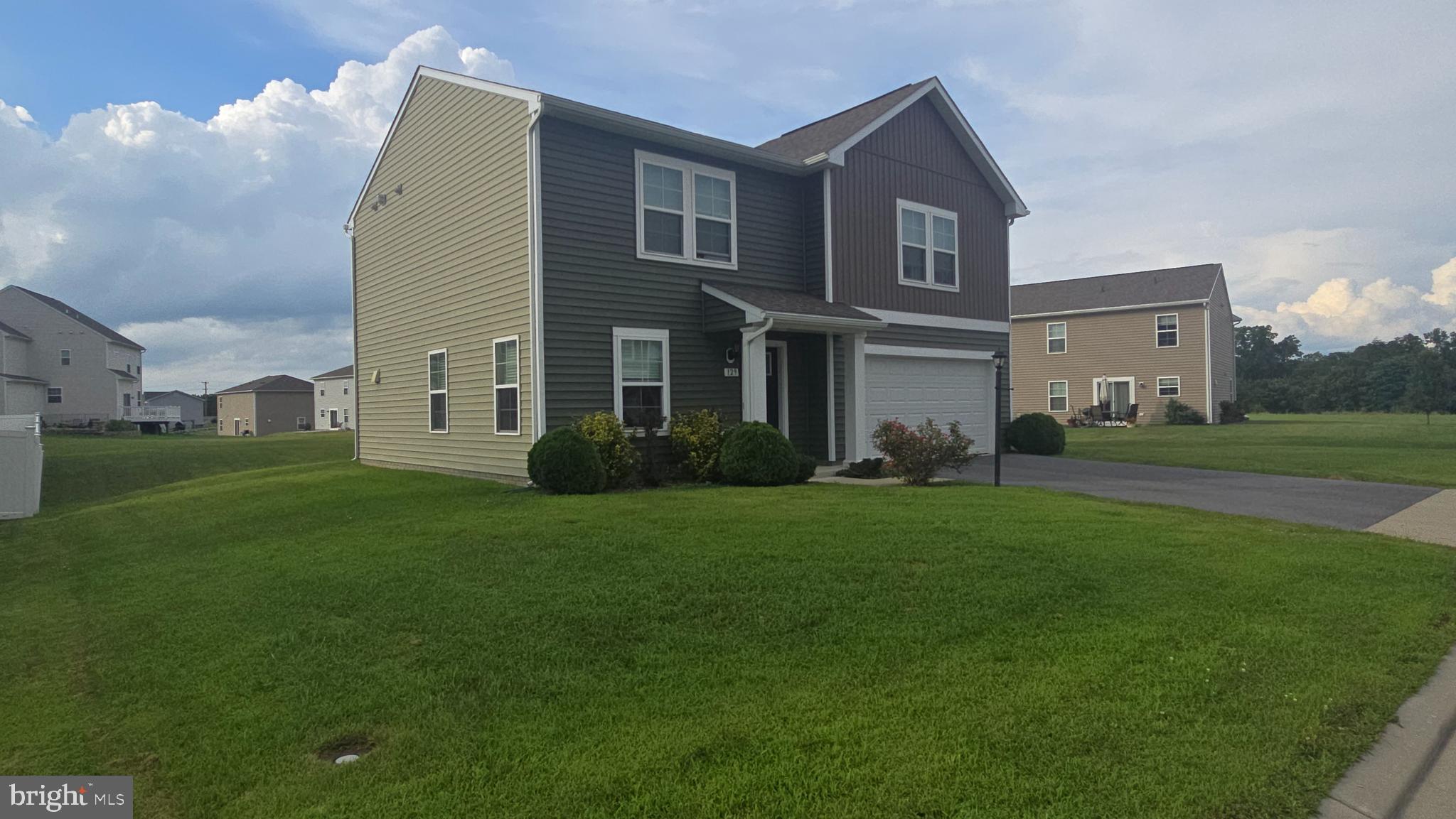 Welcome to Morning Dove II Subdivision in South Berkeley County!
129 Faye Drive is a spacious and beautifully maintained 4-bedroom, 2.5-bath home, perfect for growing families or anyone looking for more room to live, work, and play.
As you step through the front door, you'll love the open-concept layout that seamlessly connects the living room, kitchen, and dining area—ideal for entertaining or just everyday living. Need a quiet space to work or unwind? A private office is tucked into the back corner of the home, offering just the right balance of accessibility and seclusion.
Conveniently located off the main hallway, the two-car garage provides ample space for parking, storage, or keeping your vehicles protected from the elements.
Upstairs, the primary suite is a retreat of its own, featuring a spacious layout, walk-in closet, and a private bath with a large walk-in shower—perfect for relaxing after a long day.
Three additional bedrooms line the hallway, each with their own walk-in closet, offering flexibility for guest rooms, playrooms, or hobby spaces. A full second bath and a dedicated laundry room with an attached utility room (housing the water treatment system) round out the upper level.
Step outside to enjoy a large backyard—ready for your personal touch. Whether you're hosting gatherings, planting a garden, or just relaxing, there's plenty of space to make it your own.
Located just minutes from I-81, this home offers both comfort and convenience for commuters or anyone looking to stay connected while enjoying a peaceful neighborhood setting.
📍 Schedule your tour today and come see why 129 Faye Drive could be your next home!