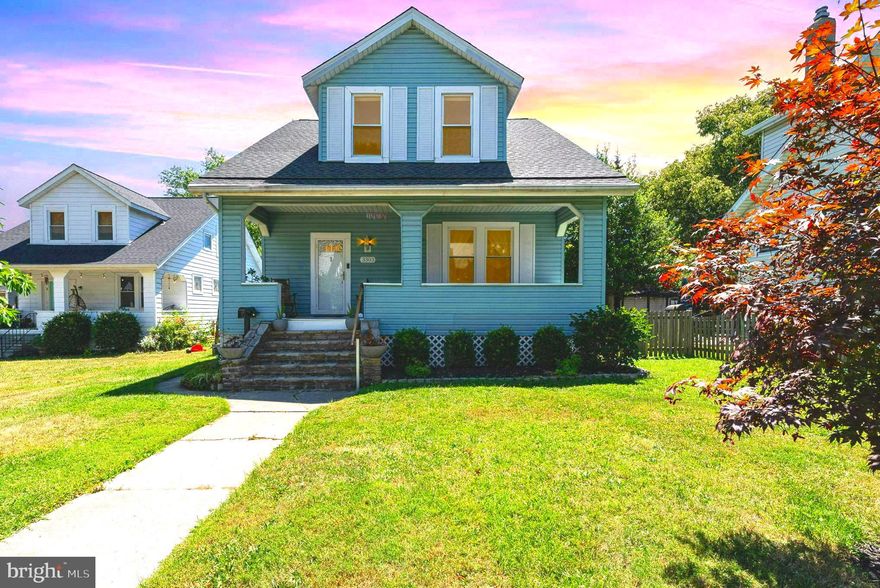 This deep  porch front home  located on a  much loved street in Hamilton where you can watch the world go by, offers 3 bedrooms upstairs and a 4th possible bedroom in the lower level with 2 .5 baths.   This one has so much original charm and character, yet has been tastefully updated just a few years ago from top to bottom.  The kitchen is the  star of the show in this home featuring a center island, granite countertops, loads of cabinet space, and stainless steel appliances.  You never feel left out in the kitchen as it opens up to the living space so you can be part of the conversation with guests.  There is even a dining room off the kitchen and half bath located under the stairs. The luxury vinyl floors run throughout the first floor and are so easy to take care of. The back sunroom is a great place to curl up with a book  or venture out to the deck that overlooks the fully fenced backyard and detached 2 car garage with off street parking pad!  The upstairs bedrooms all have walk-in closets!  The lower level is finished with a great entertaining space and a 4th bedroom and a full bath. The laundry room is located in the lower level with additional storage space. The roof has just been replaced.  Come live your best life right in Hamilton on Gibbons Ave!
