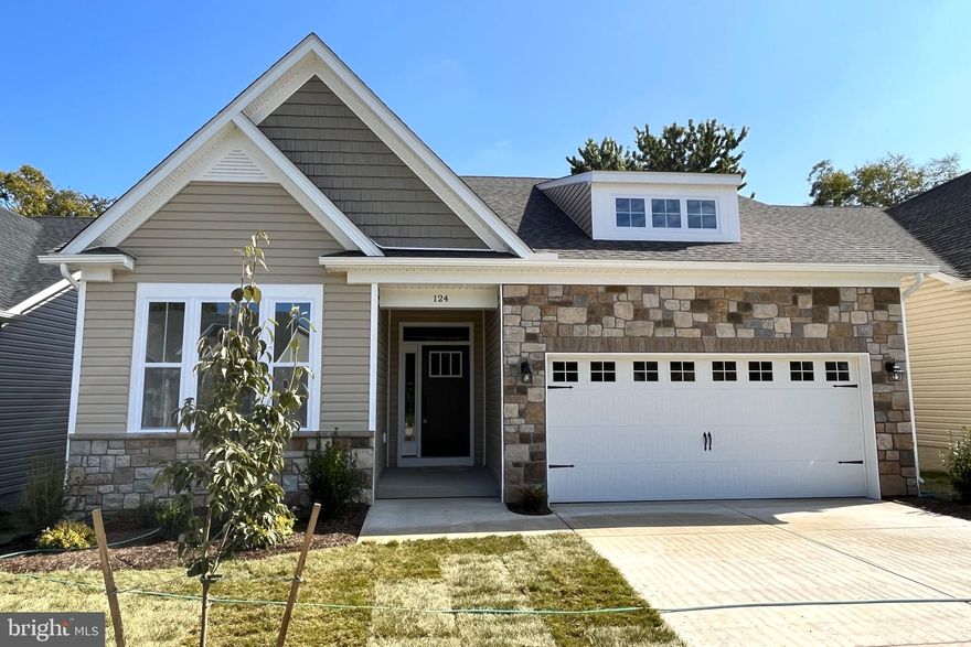 QUICK MOVE IN !!  This price includes $20,330 of free Incentives and $114,120 of Upgrades and Options!  Contract by November 30th and move in right away.   This home is competitively Priced, with Low Monthly Home Owners Association Fees.  Free Options include Kitchen Quartz Countertops, Gas Fireplace, Kitchen Roll Out Trays, Upgraded Carpet, Frameless Shower Door and Comfort Height, Elongated Toilets.      
Award winning Ashbrook Homes II offers exciting floor plans and beautifully detailed interiors and exterior elevations.   This new home in Abram's Chse, Winchester's newest 55+ active adult community conveniently located on the east side of Winchester for an easy drive to Northern VA.  This popular Edinburg model has features and options that most buyers are looking for today with over $114,120 worth of options and upgrades!   Bask in the sun in your sunroom on the back of the house!  Fully finished basement with rec room, large bedroom with large walk in closet and full bath and walk out to your patio!  Cooking enthusiasts will enjoy Kitchens with huge center islands and quartz countertops, slow close cabinets,  cabinet roll out trays,  and stainless appliances.  The primary bath has beautiful tile floors and showers, transome windows to allow natural light  and a large walk in shower.  Ashbrook Homes II is known for their large windows and transoms and attention to details.  The flooring is luxury vinyl plank,  tiles, and carpet in the bedrooms.  The bonus room is an office and the laundry room also serves as a media and mud room.  A few more features include floor receptable in the great room, ceiling fan pre wires, lignt dimmers, fireplace with slate surround, garage is sanded and painted, pocket doors in primary bath and closet, additional windows and, bay windows.   In addition, the elevation is an upgrade to include more stone than the standard elevation.   Call to schedule an appointment today! Photos Similar.