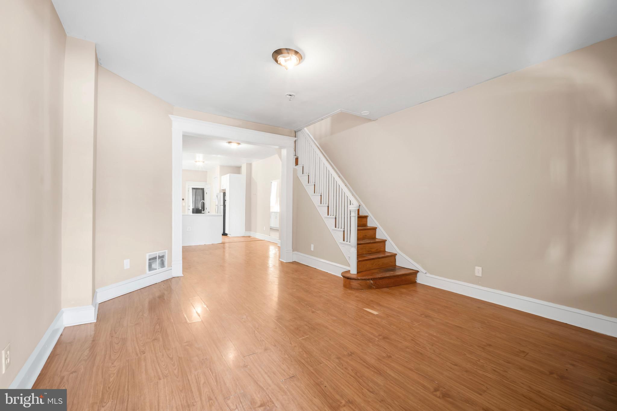Welcome to 1713 S 58th St. This updated 3-bedroom rowhome in Kingessing offers a comfortable blend of modern touches and classic charm. The first floor features an open-concept layout with a modern kitchen complete with quartz countertops, stainless steel appliances, and a convenient powder room. Upstairs, you'll find three generously sized bedrooms and and updated hallway bathroom. Out back, enjoy a private patio—perfect for relaxing or entertaining. The large unfinished basement offers plenty of storage space and potential for additional use. This home is freshly painted throughout, with beautifully refinished hardwood floors and tons of natural light. Central A/C has been installed to make sure all months of the year are comfortable. A solid home with thoughtful updates in a well-connected neighborhood. Schedule your tour today!
